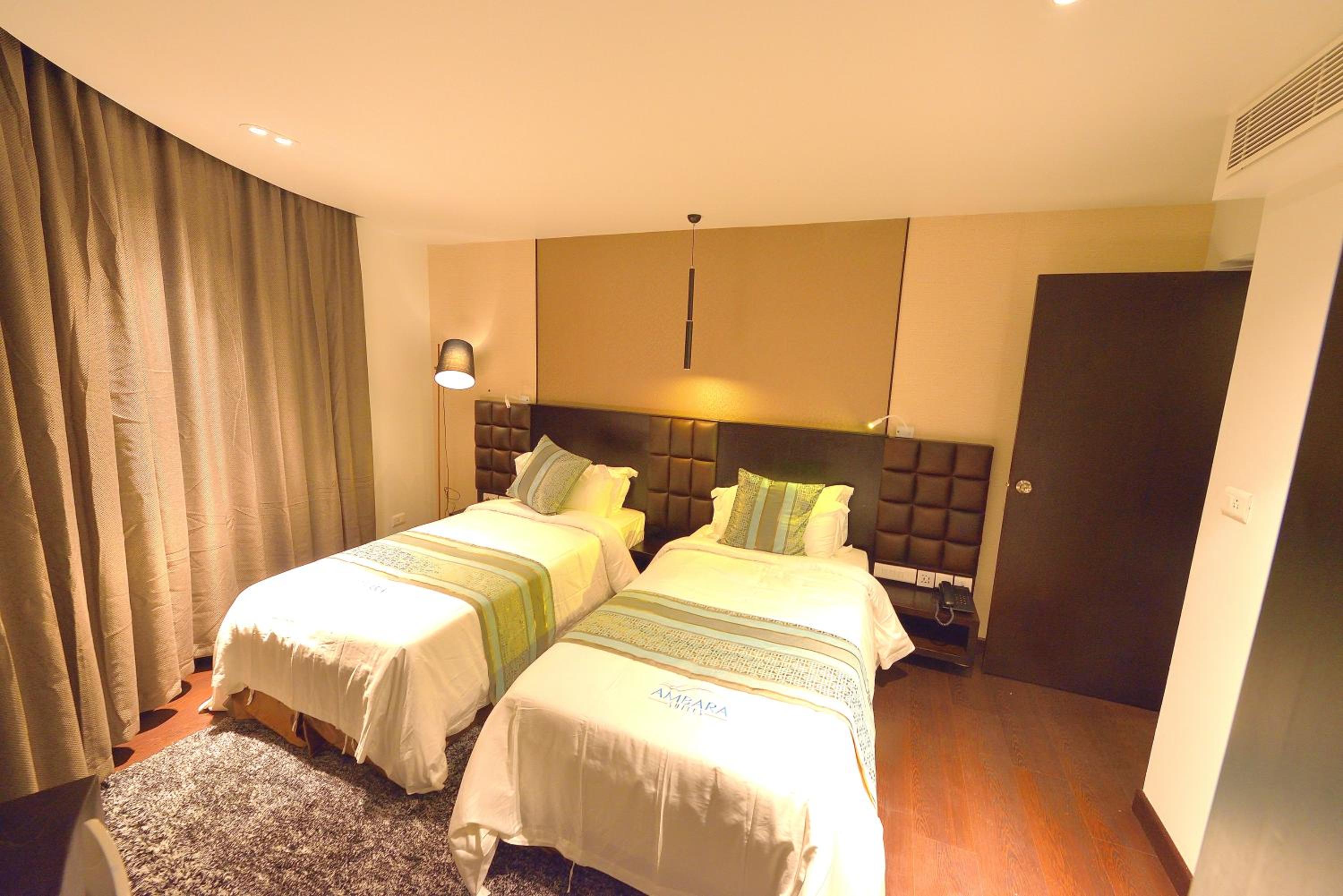 Deluxe Queen Suite - Photo 2