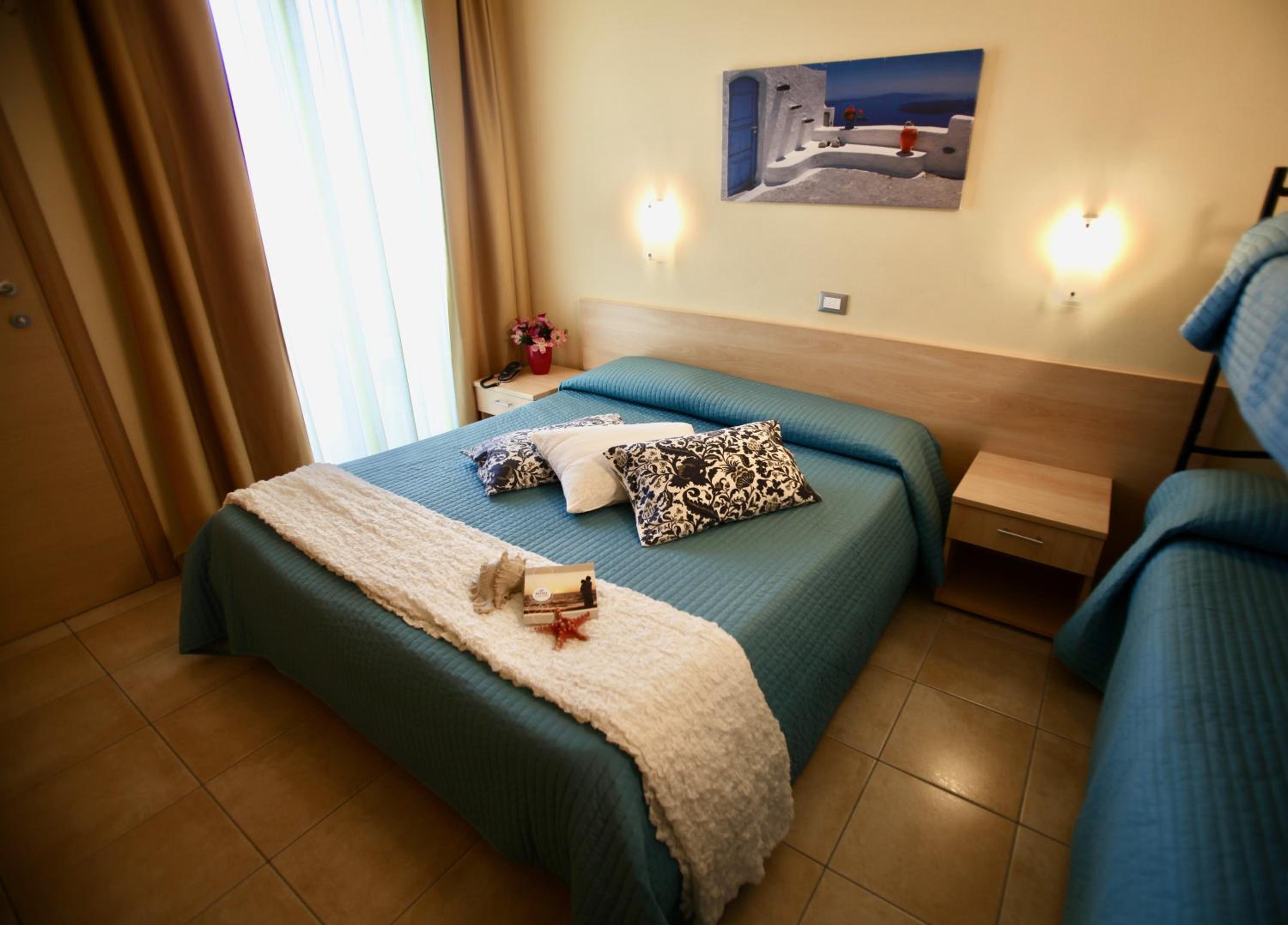 Quadruple Room with Balcony photo 1