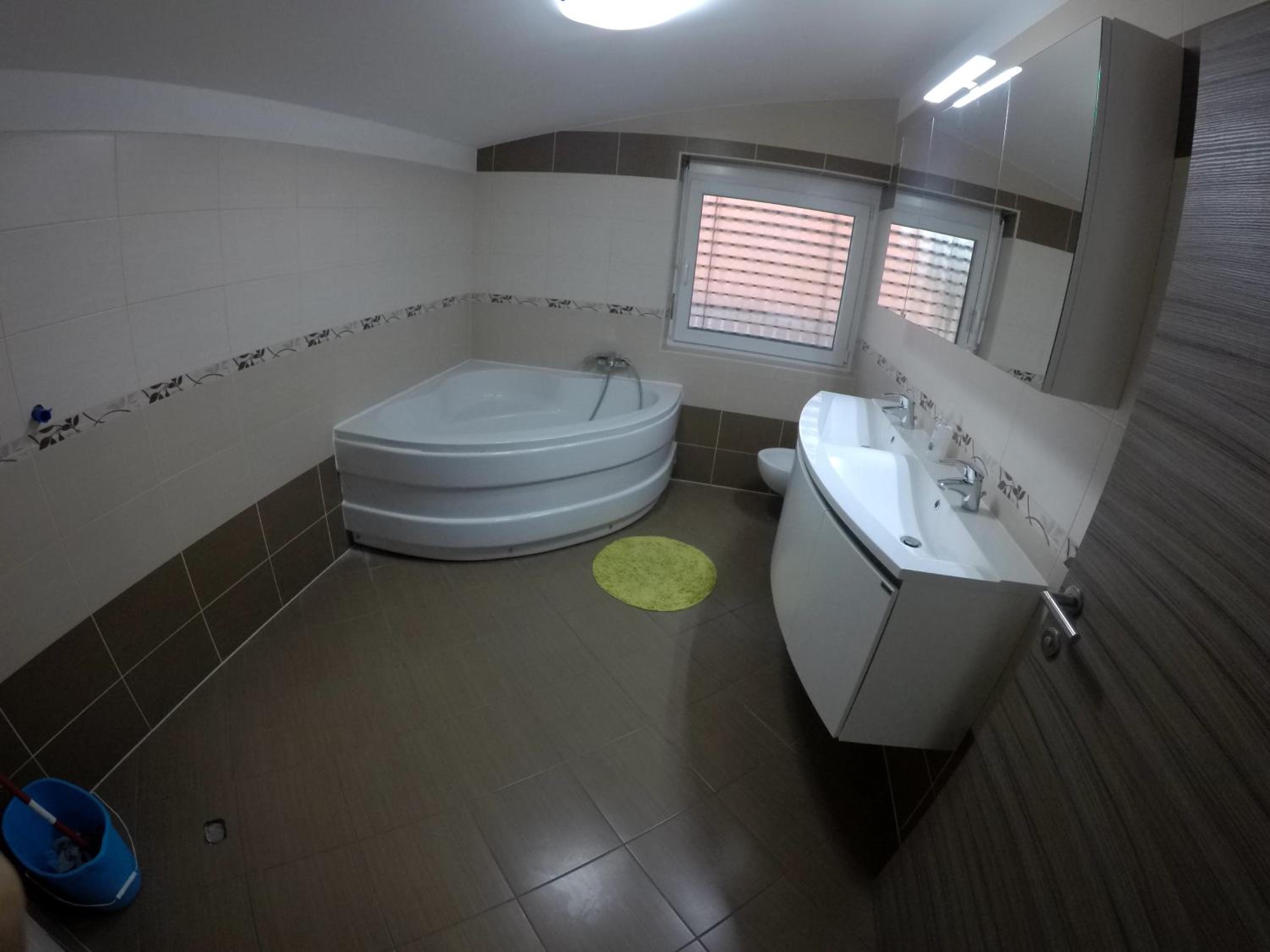 Three-Bedroom Apartment - Photo 9