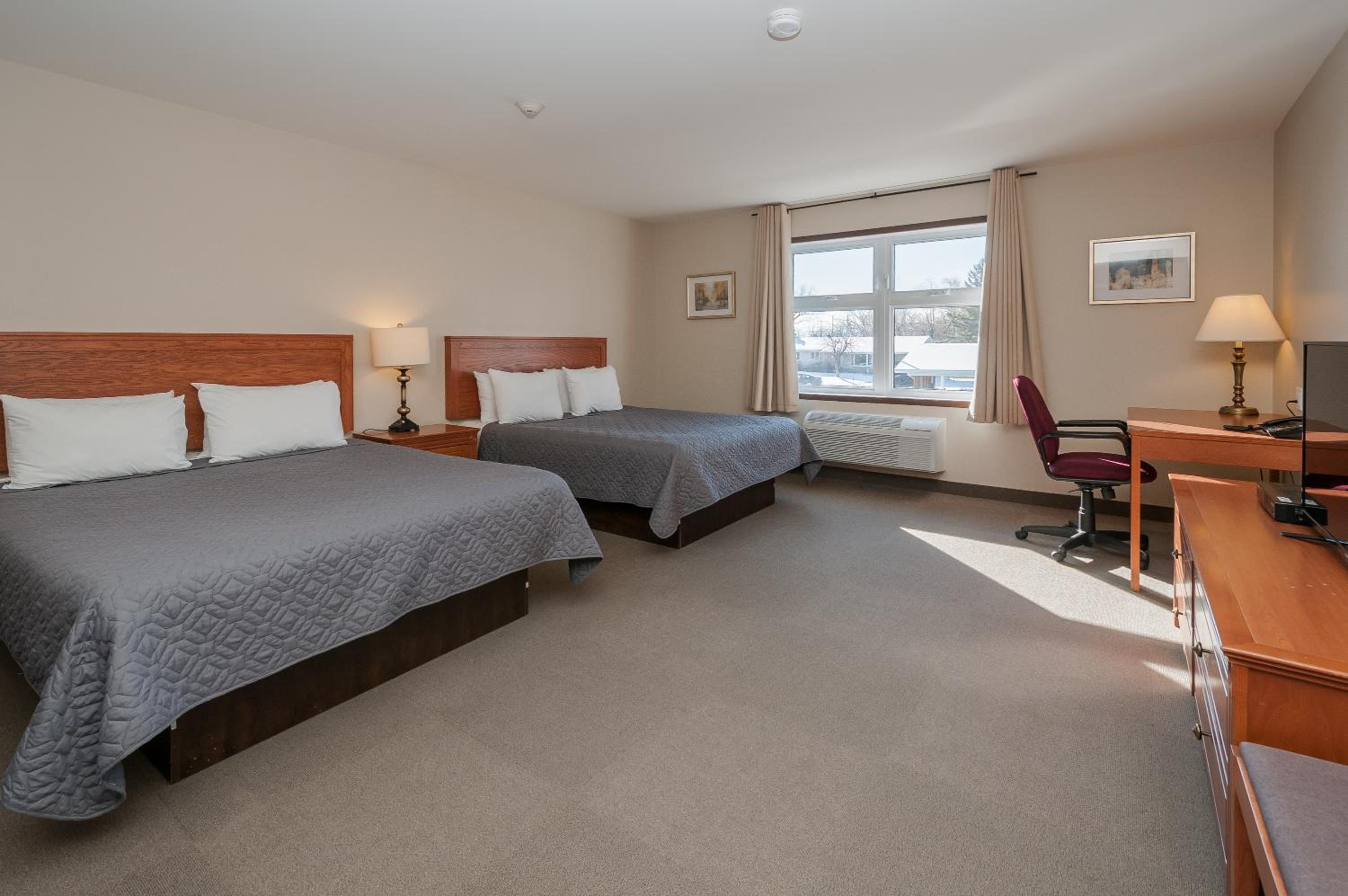 Deluxe Queen Room with Two Queen Beds - Photo 1
