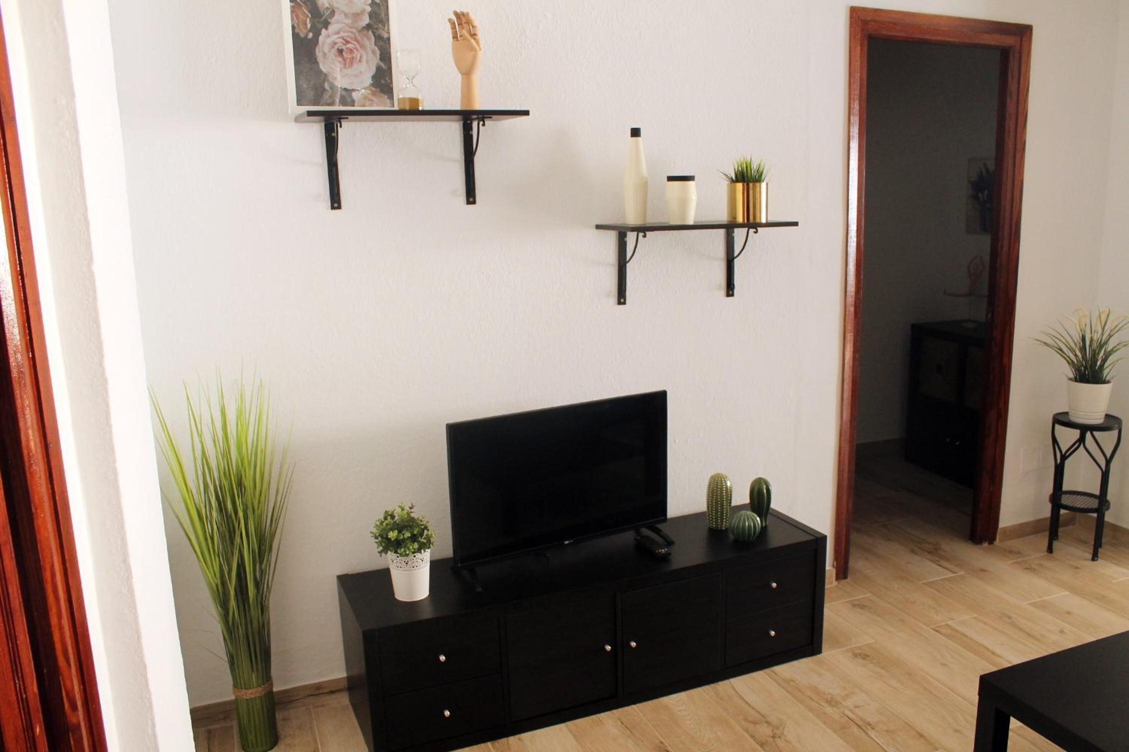 Three-Bedroom Apartment - Photo 7