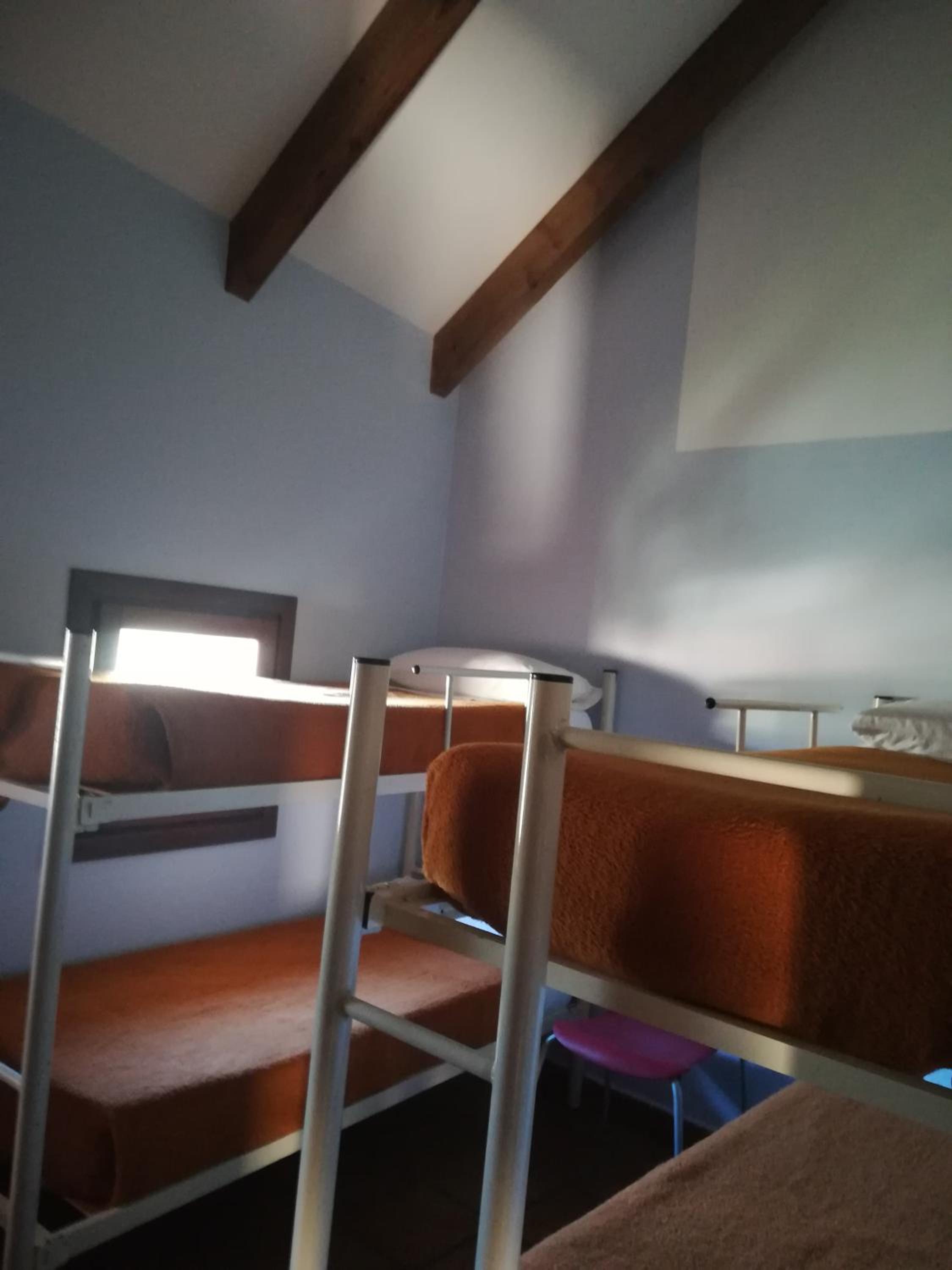 Cama en habitación compartida de 4 camas