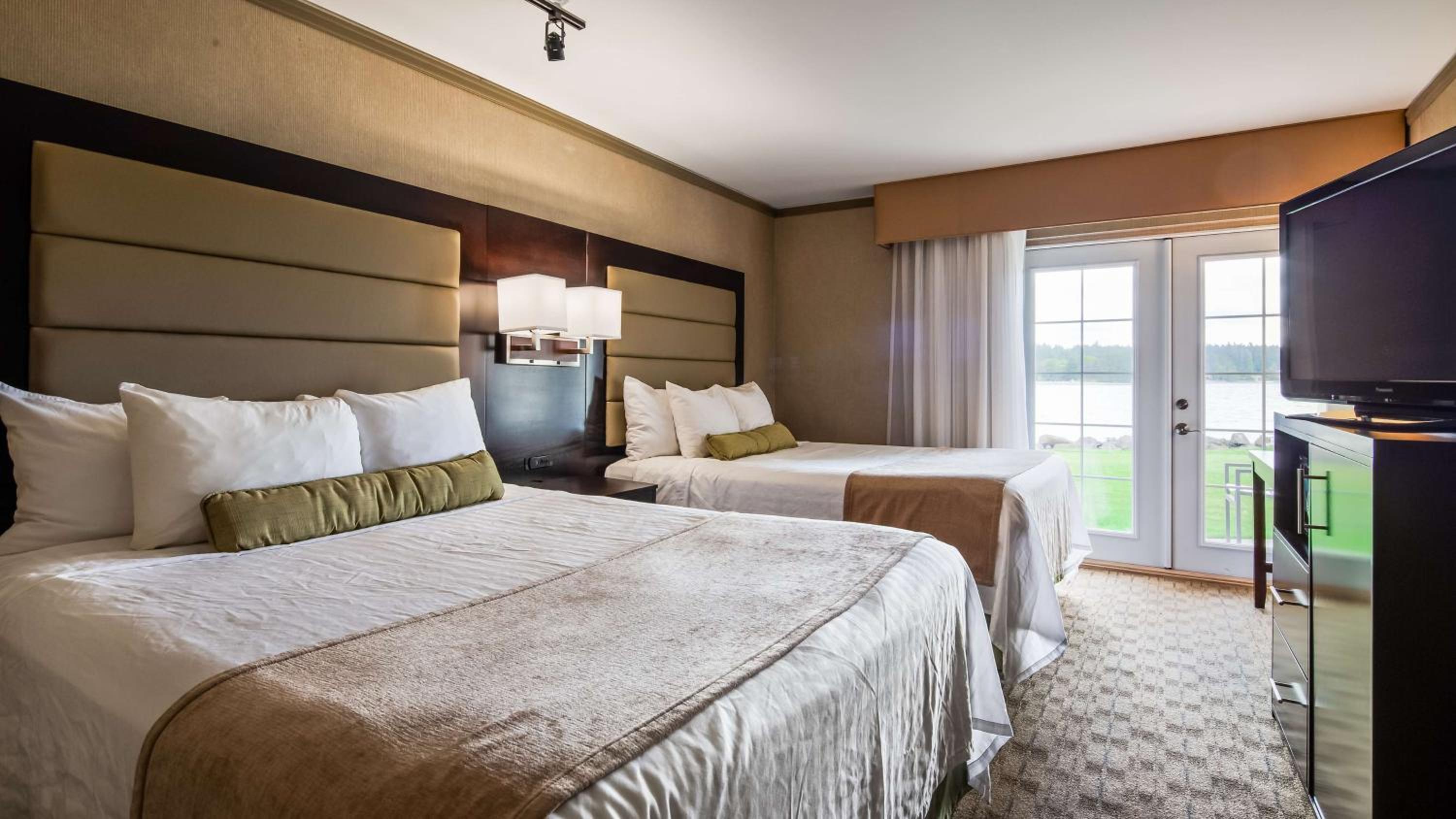 Deluxe Queen Room with Two Queen Beds and Water View - Photo 1