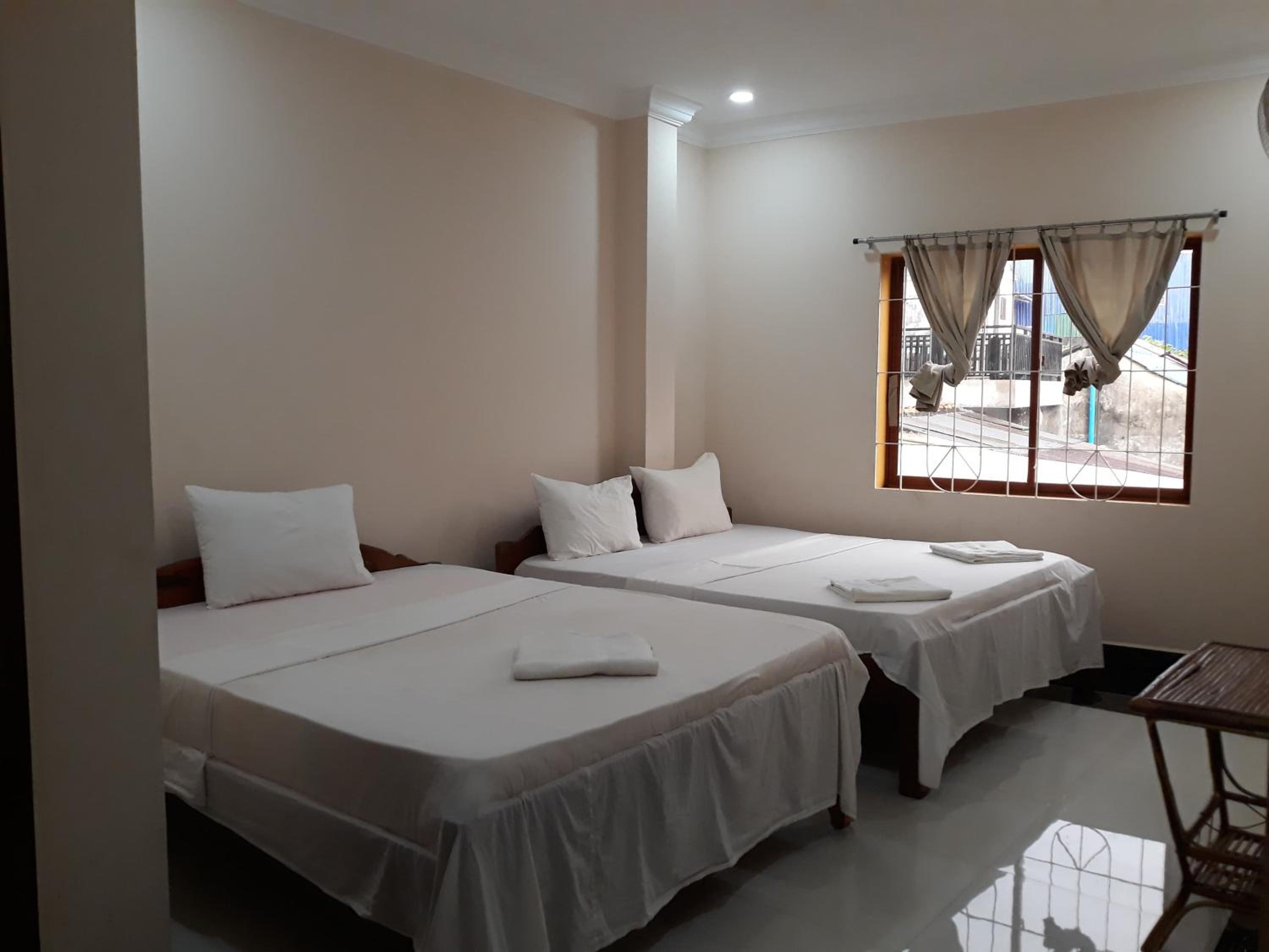 Twin Room with City View - Photo 1