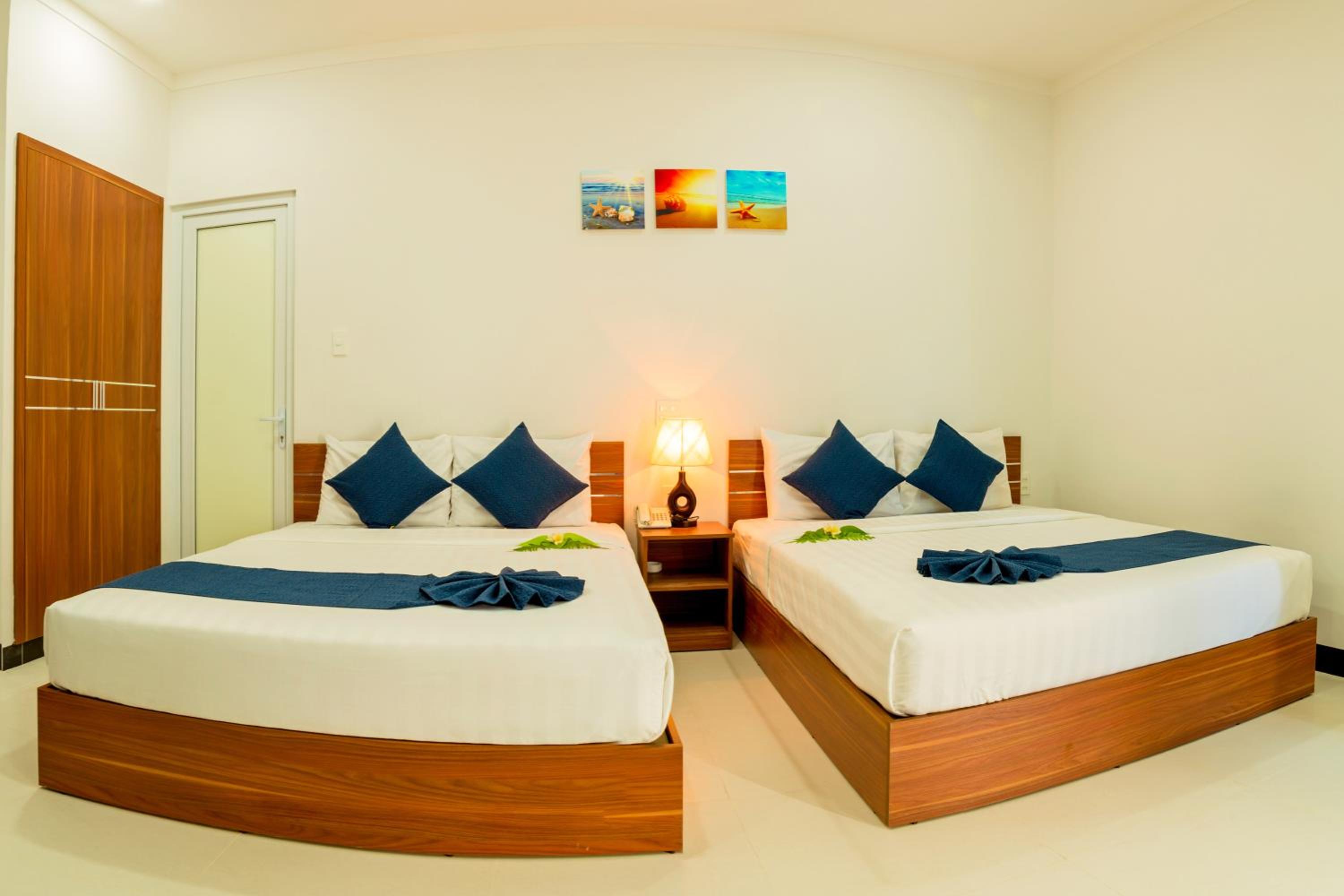 Deluxe Triple Room - Photo 4