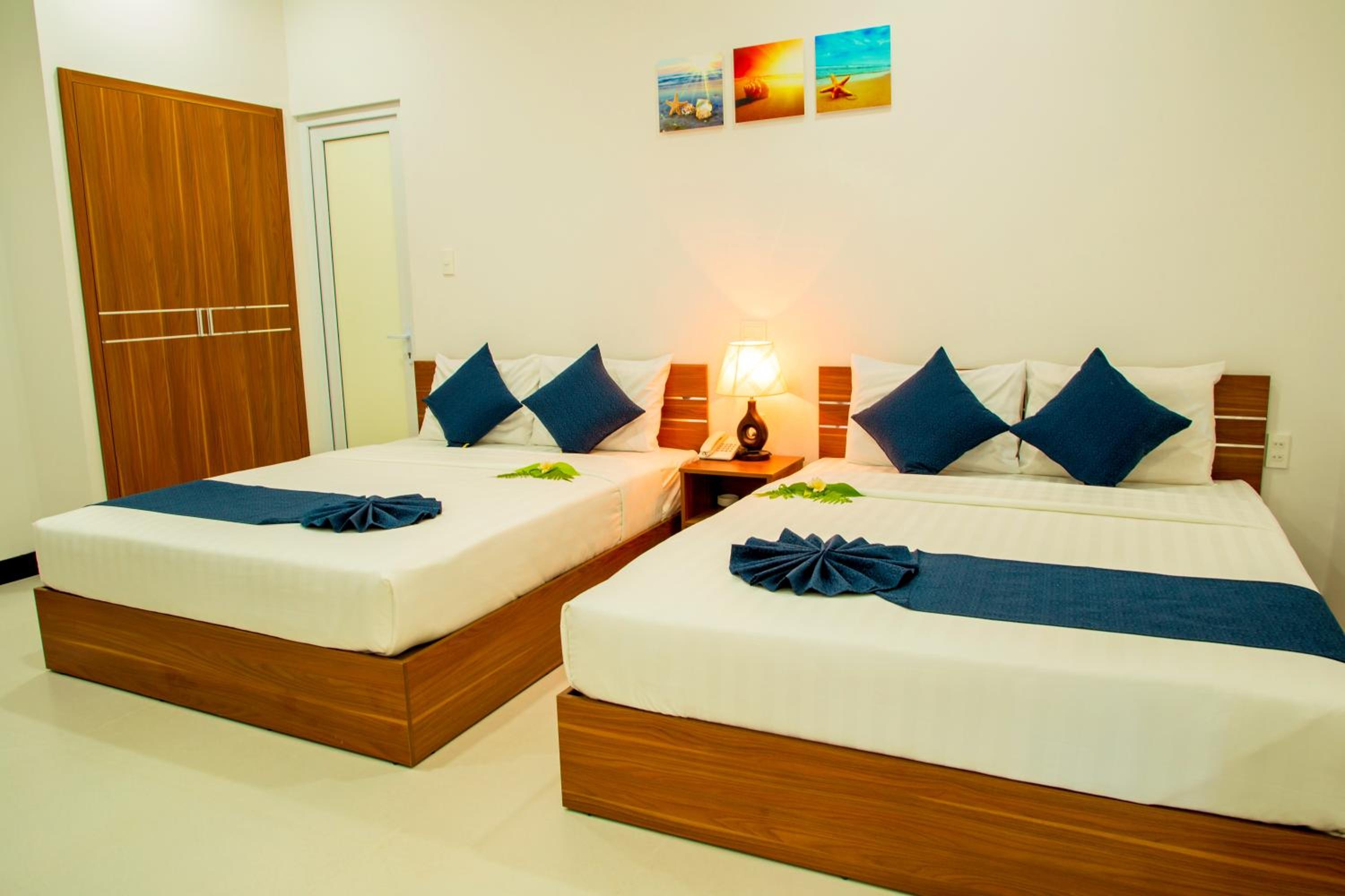 Deluxe Triple Room - Photo 6