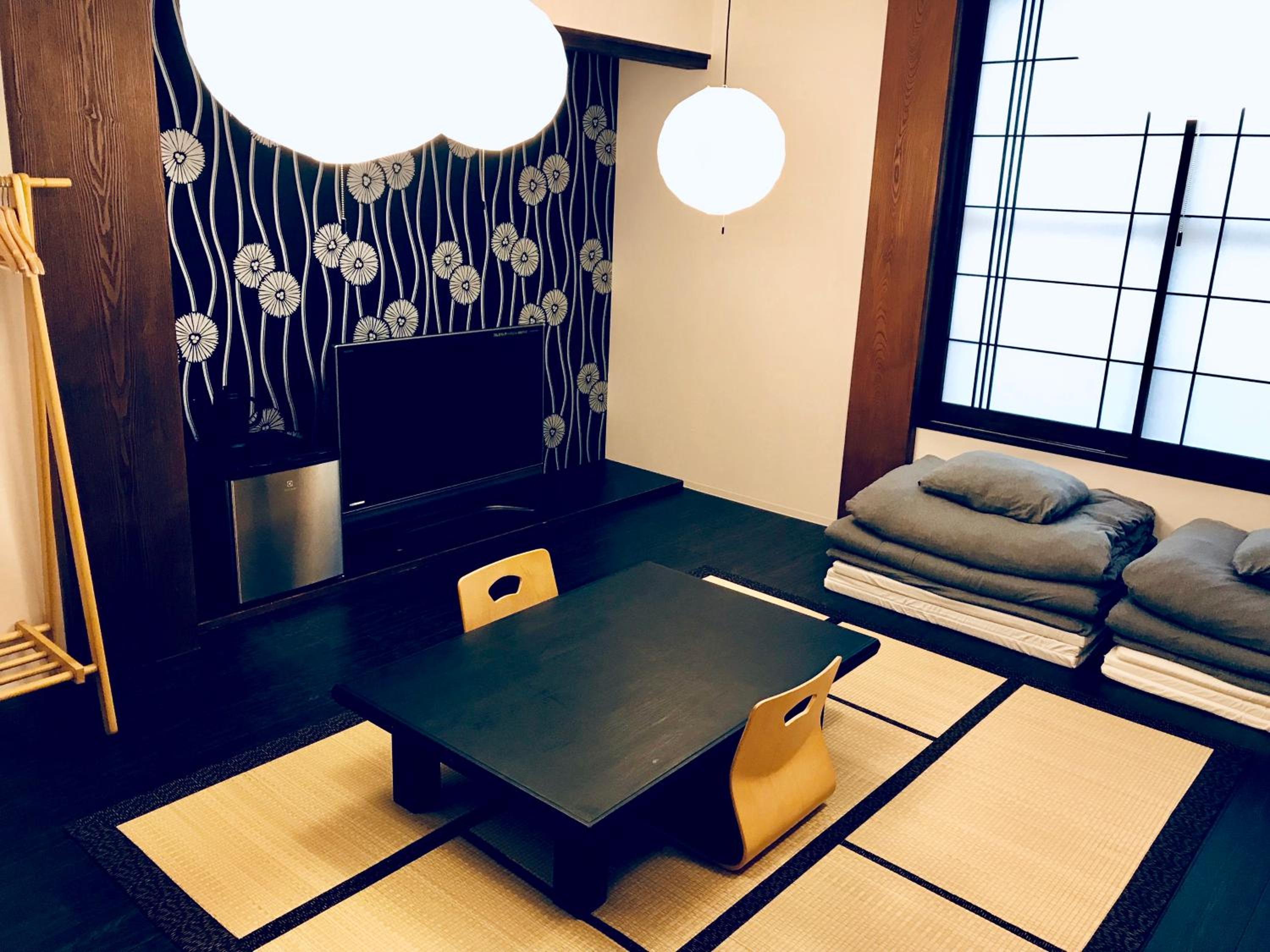 Quadruple Room with Shared Bathroom