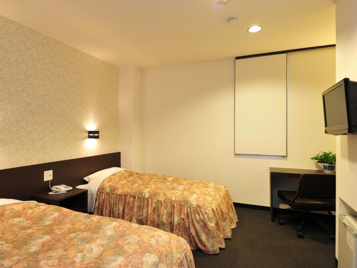 Twin Room - Non-Smoking - Photo 1
