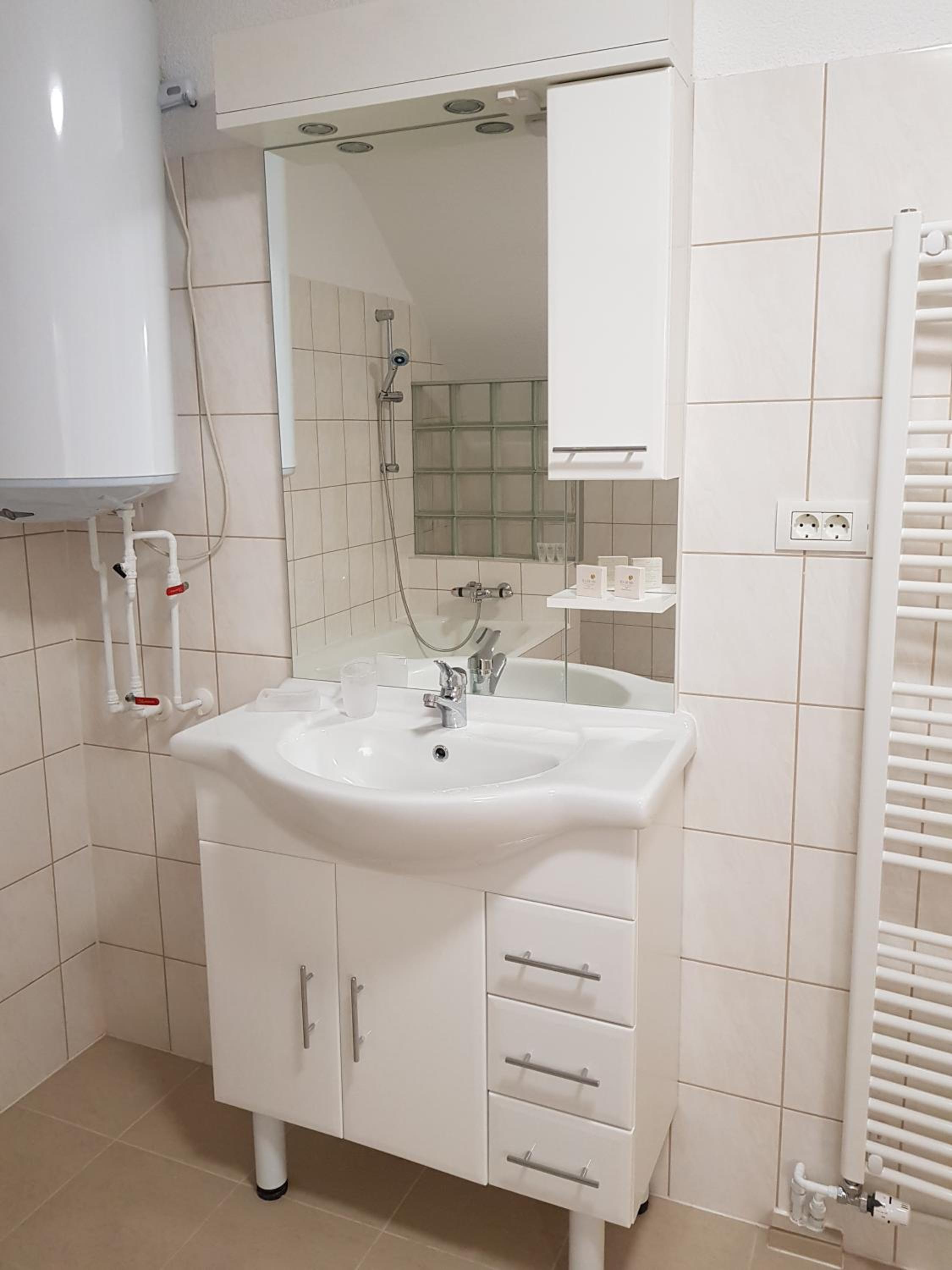Three-Bedroom Apartment - Photo 10