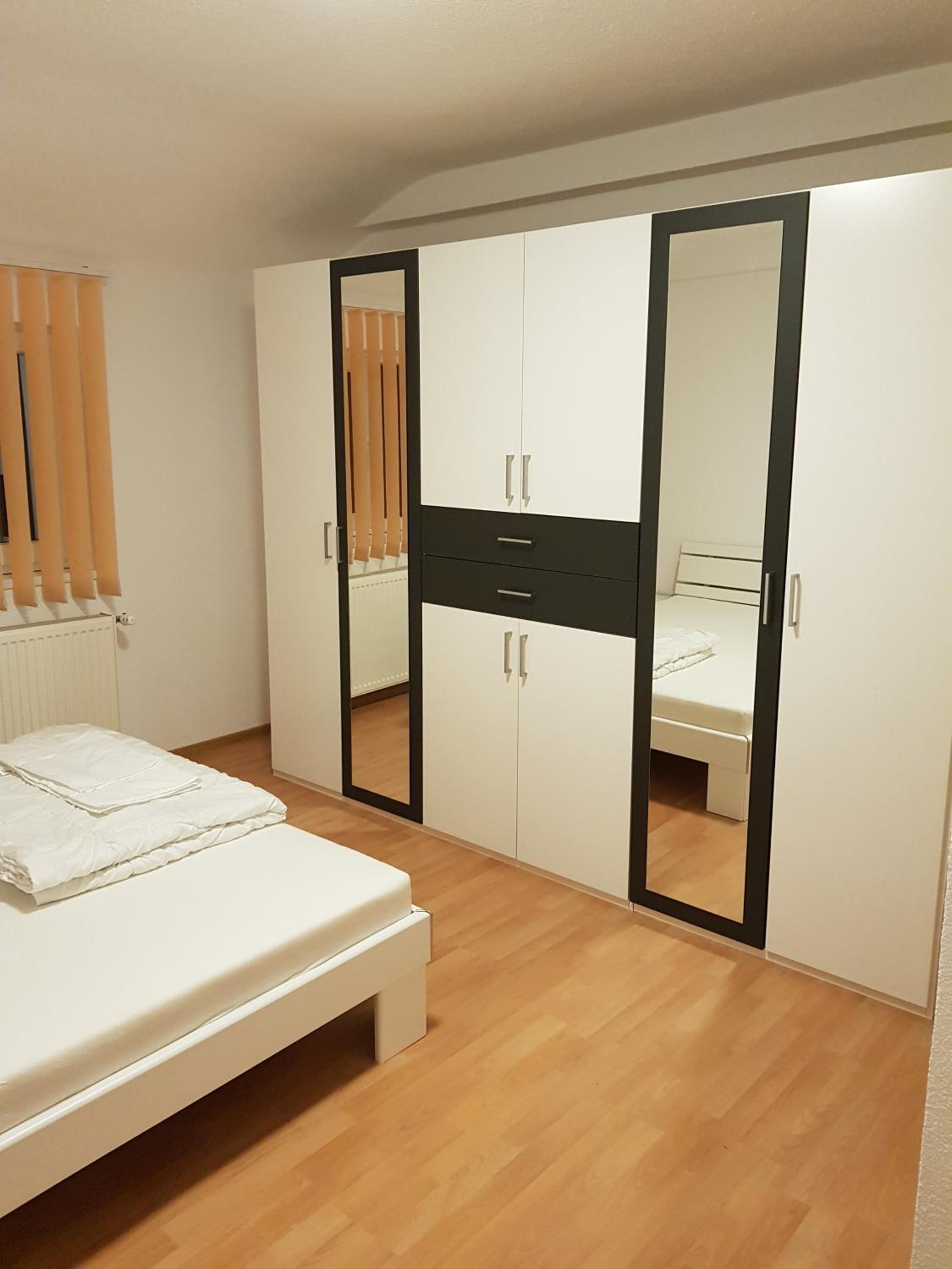 Three-Bedroom Apartment - Photo 13