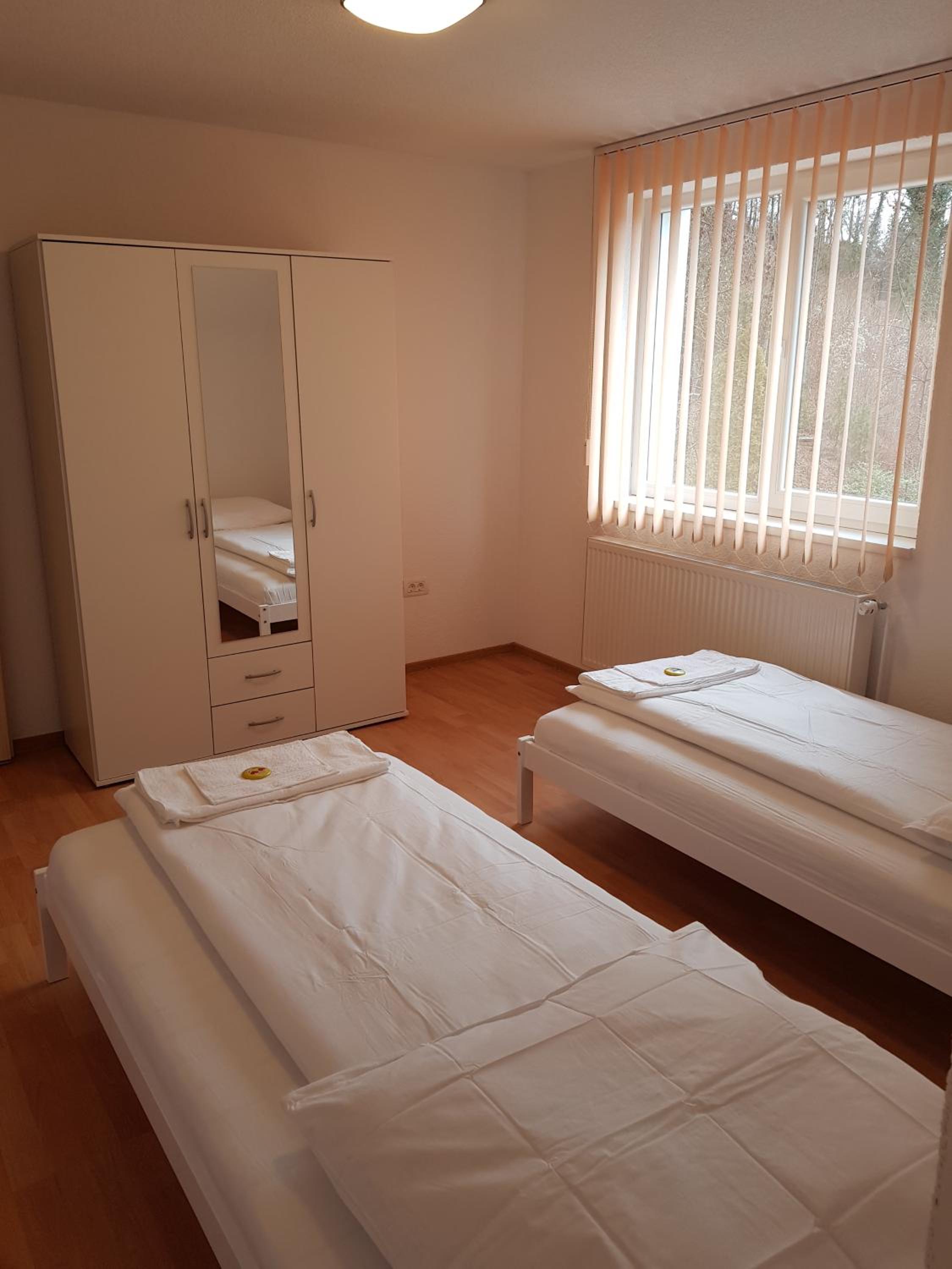 Three-Bedroom Apartment - Photo 18