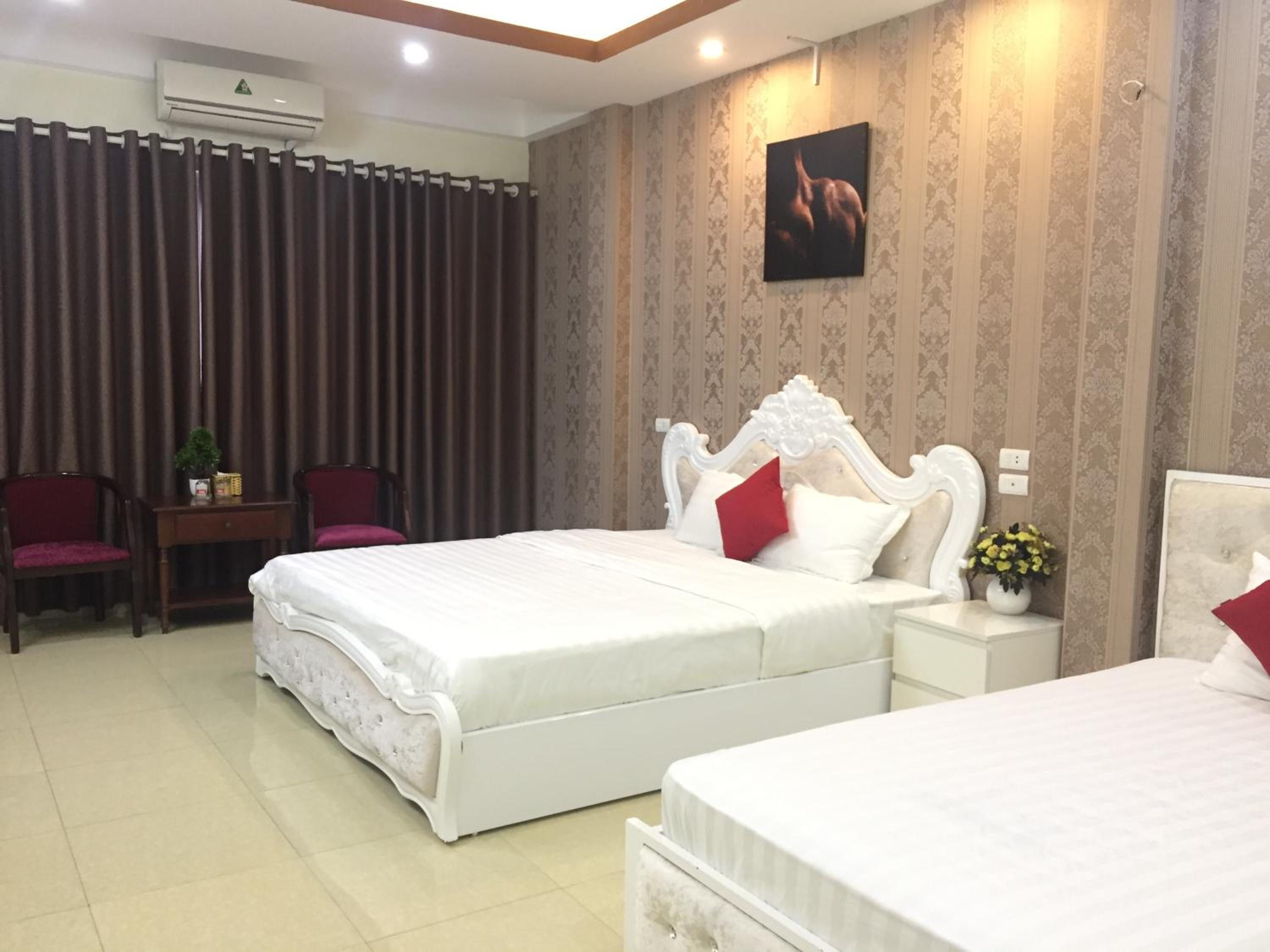 King Room with Two King Beds - Photo 1