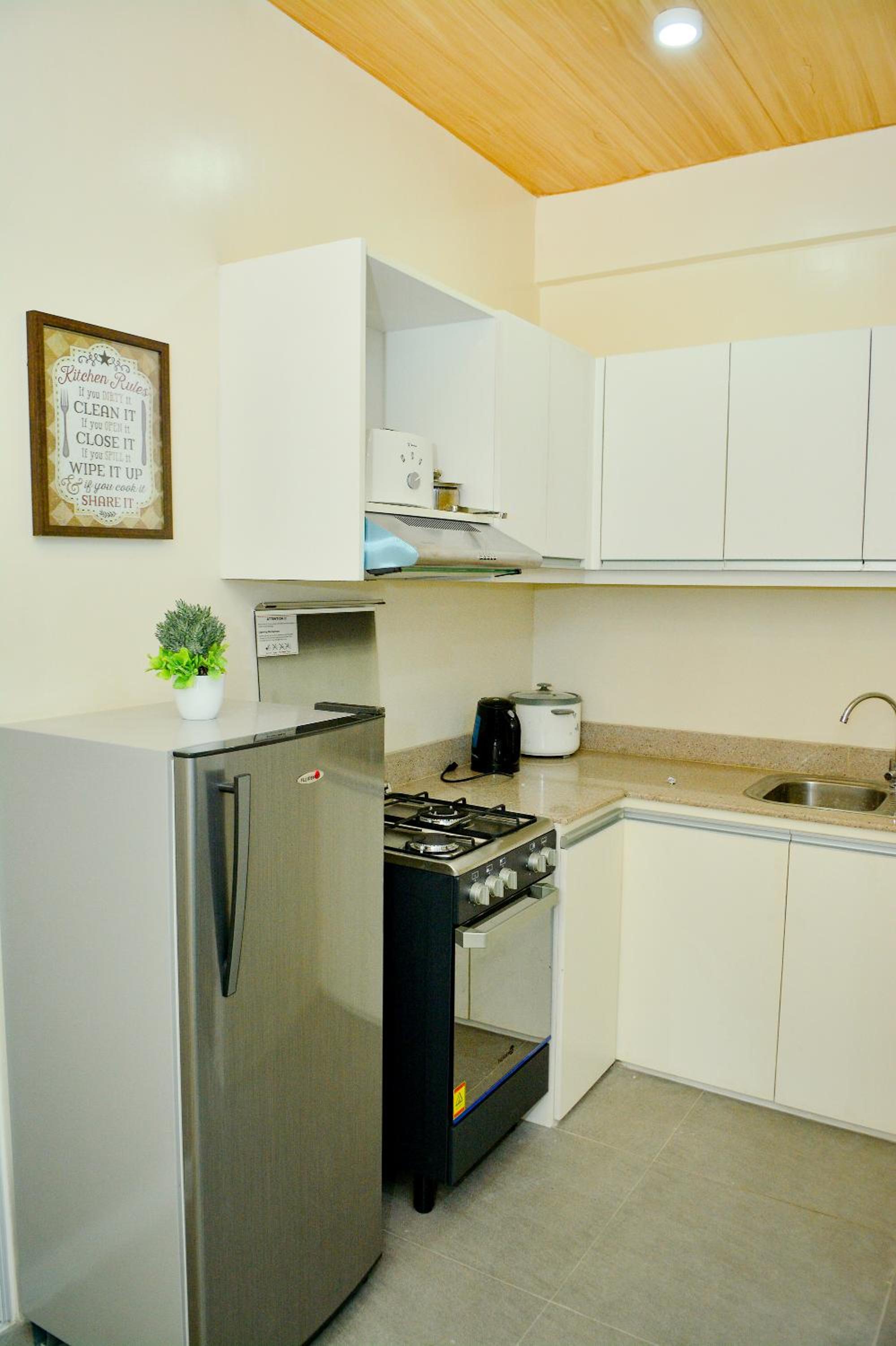 Three-Bedroom Apartment - Photo 2