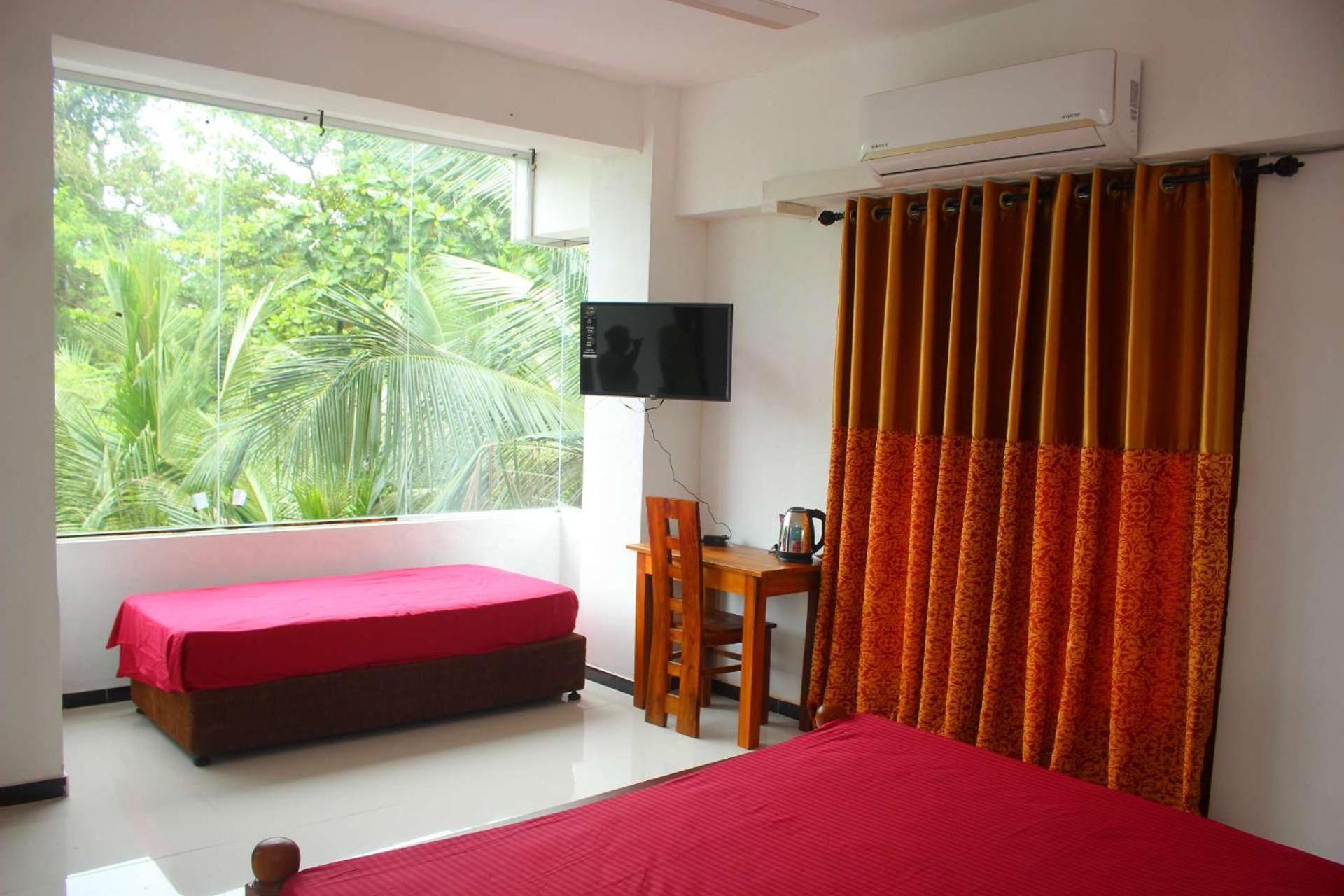 Deluxe Triple Room photo 3