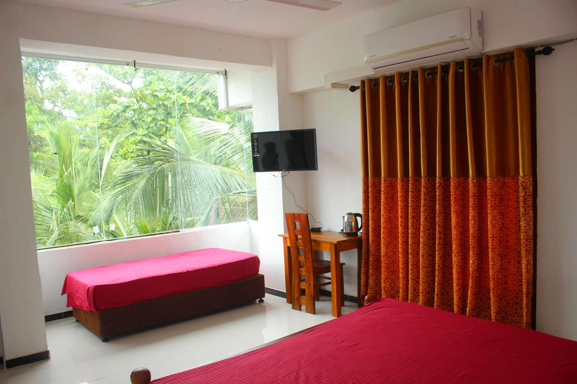 Deluxe Triple Room photo 2