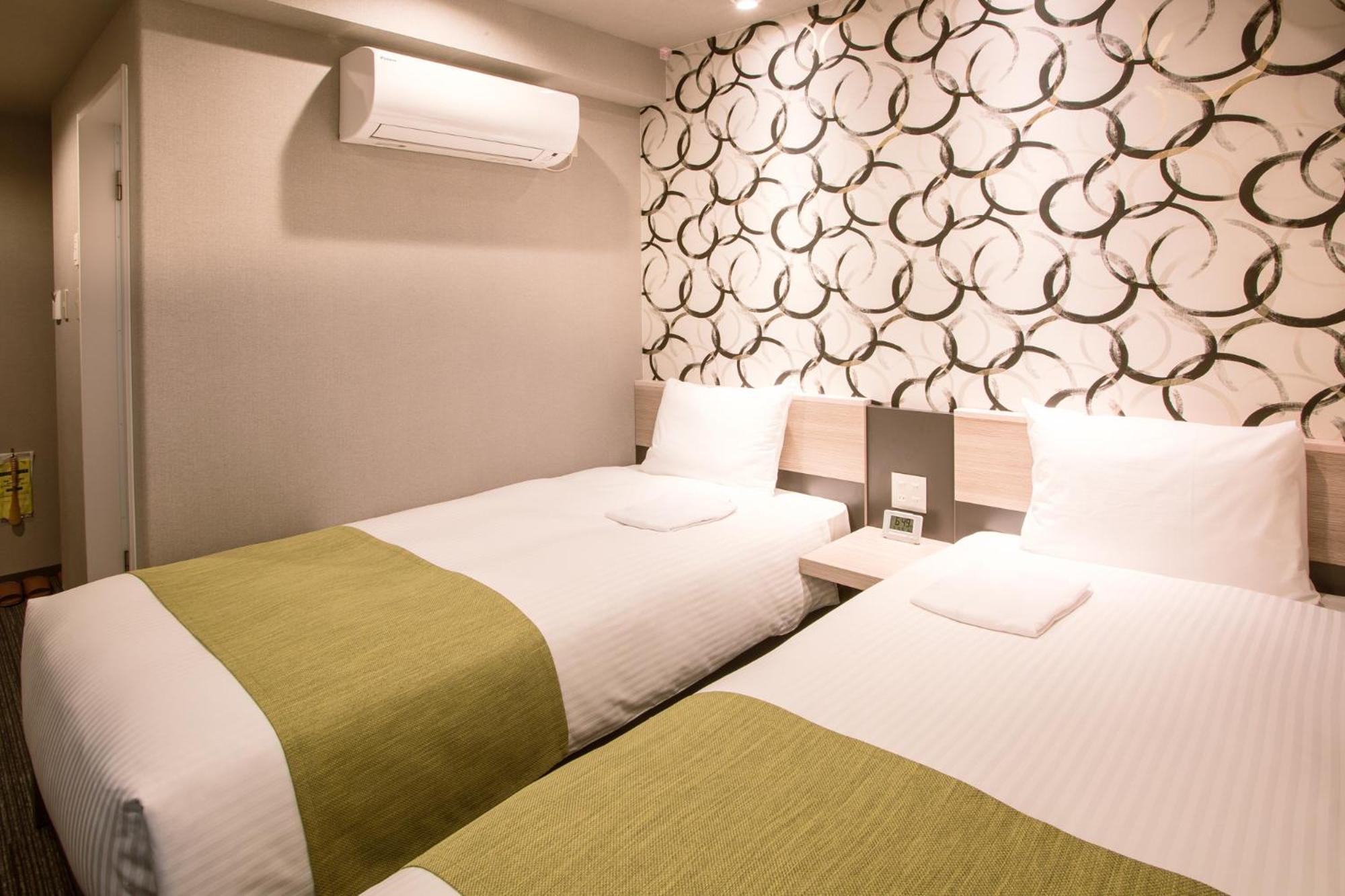 Economy Twin Room - Non-Smoking - Photo 8