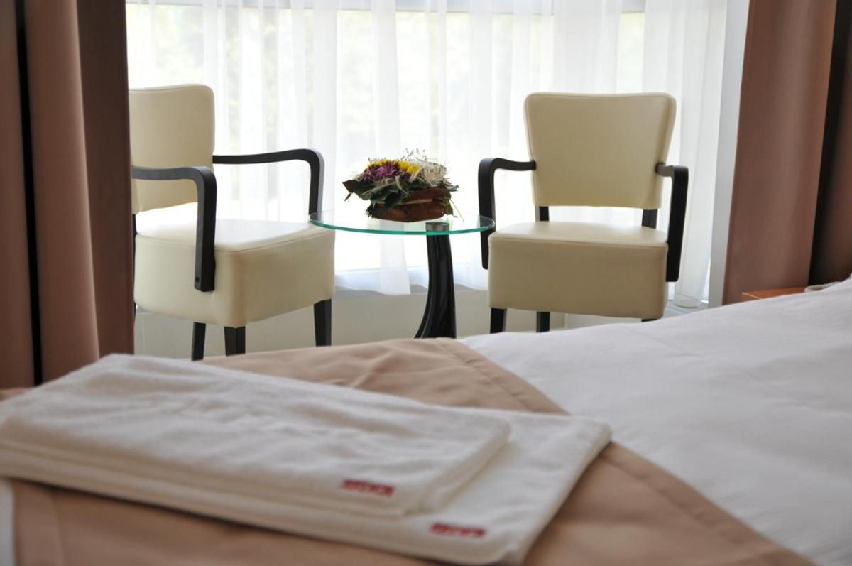 Standard Twin Room - Photo 1