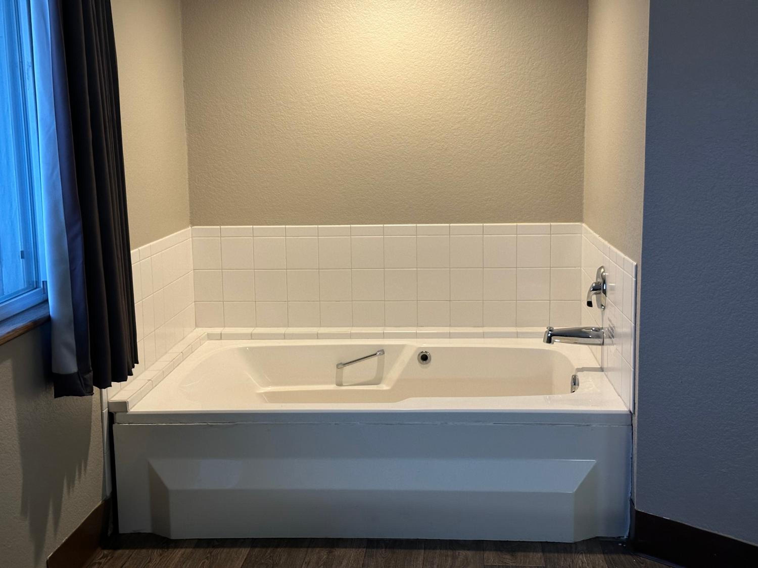 Deluxe King Suite with Jetted Tub, Non-Smoking photo 1
