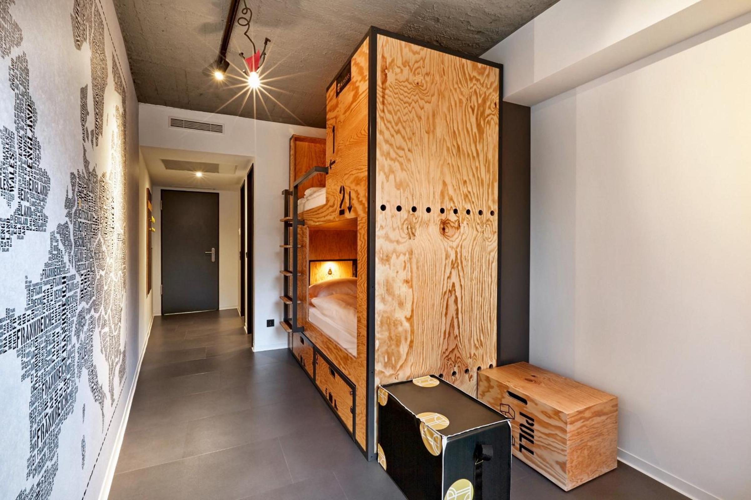 Bed in double room with shared bathroom