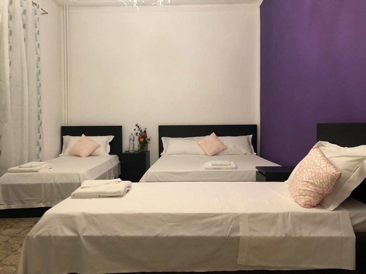 Economy Quadruple Room with Shared Bathroom