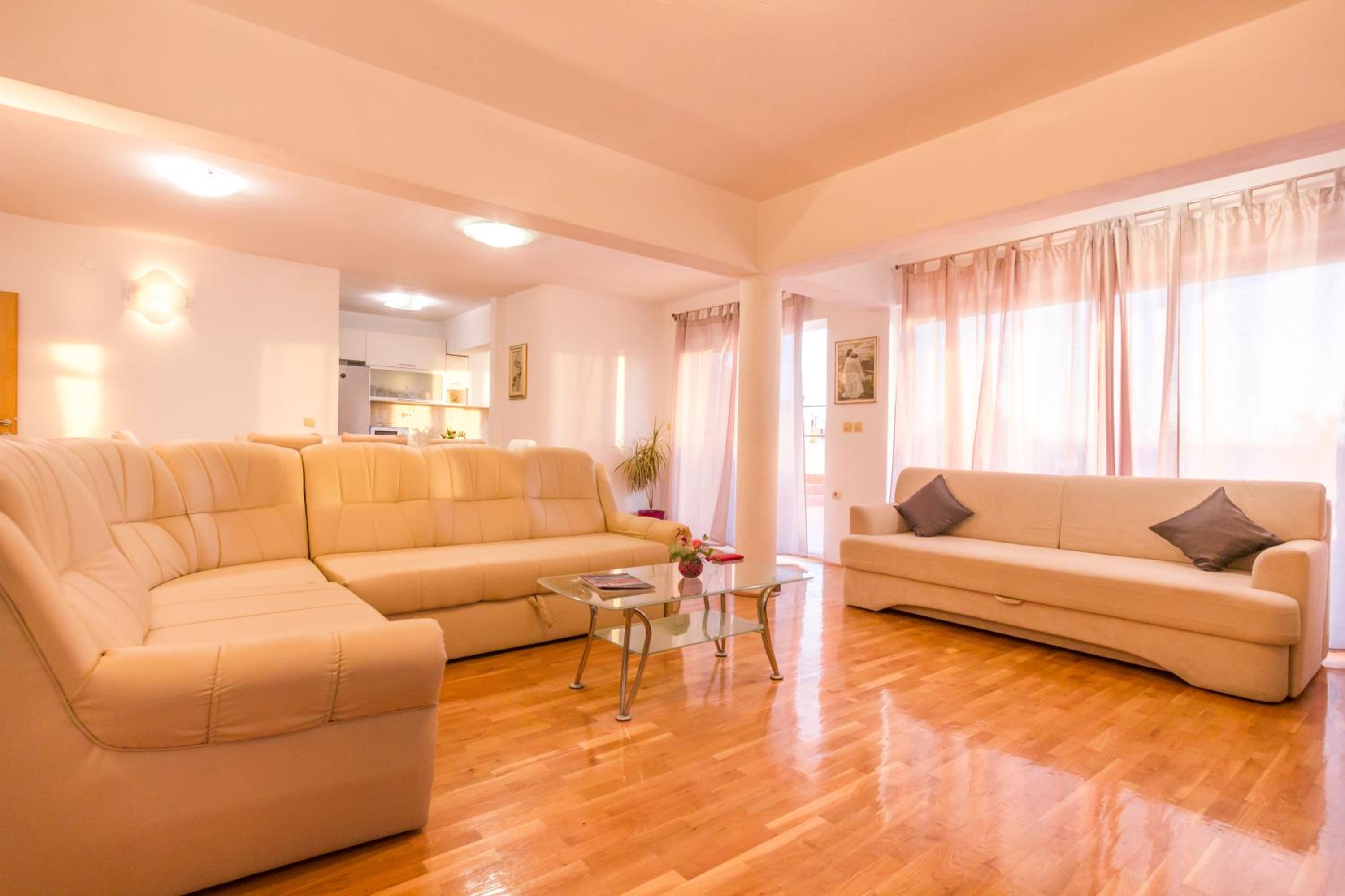 Three-Bedroom Apartment with Balcony and Sea View