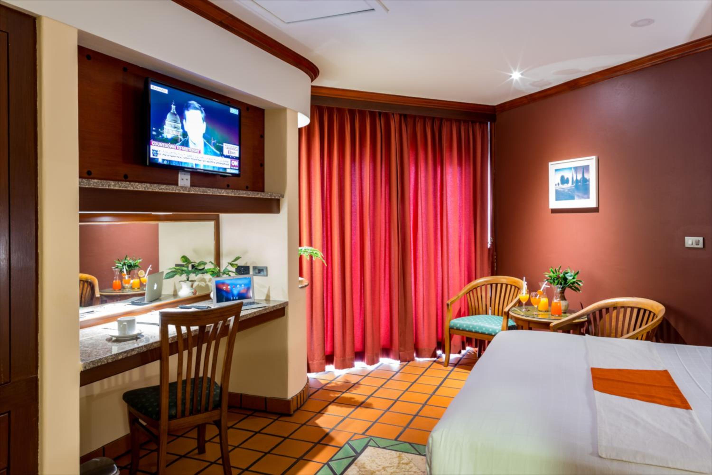 Deluxe Room - Photo 16