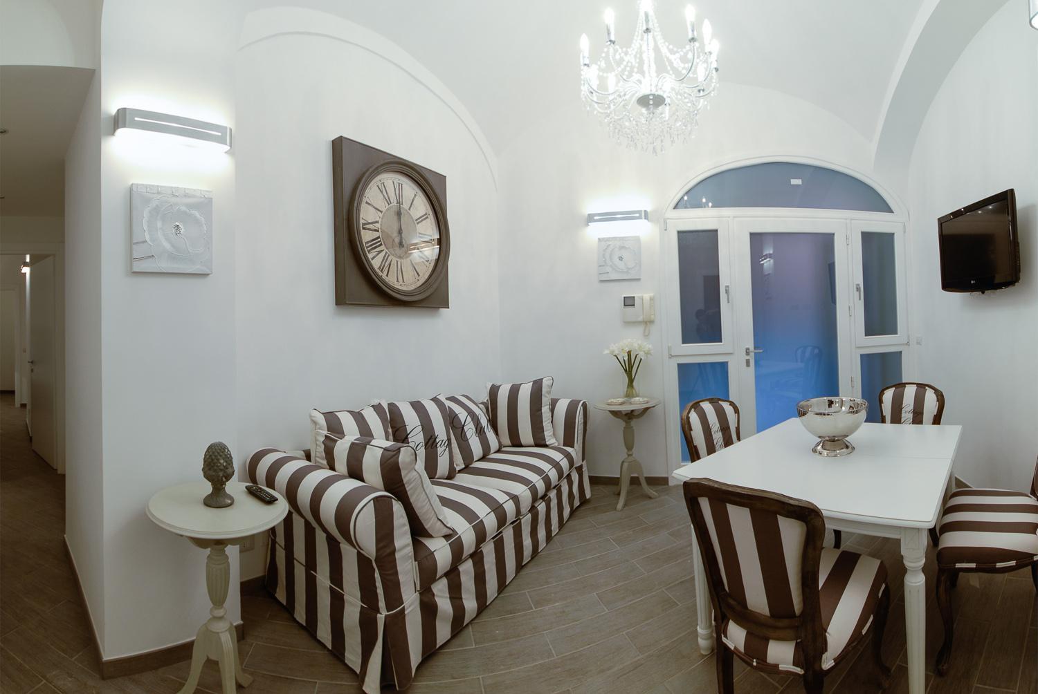 Two-Bedroom Apartment - Address: Via del Colosseo 23