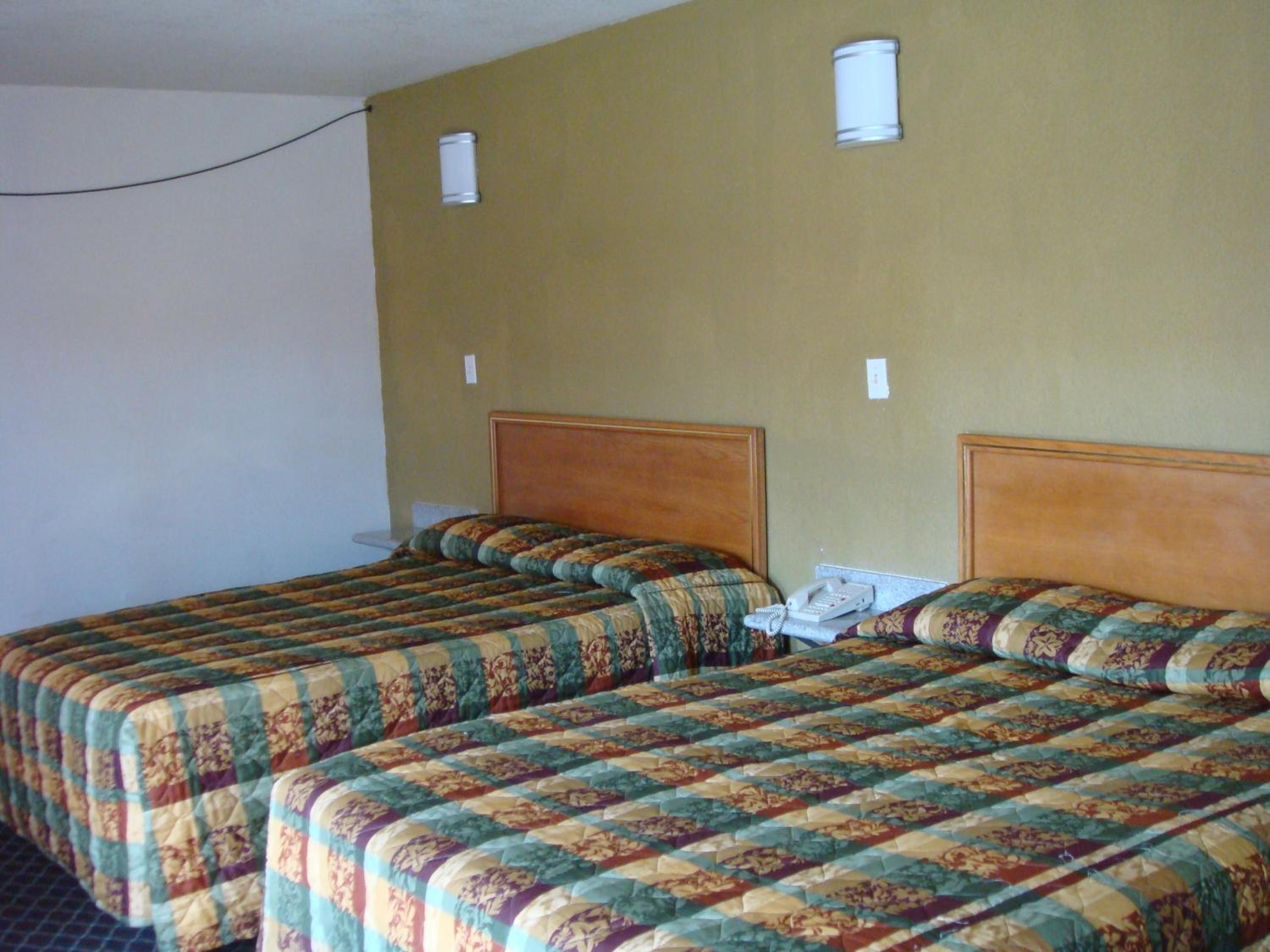 Queen Room with Two Queen Beds - Photo 1
