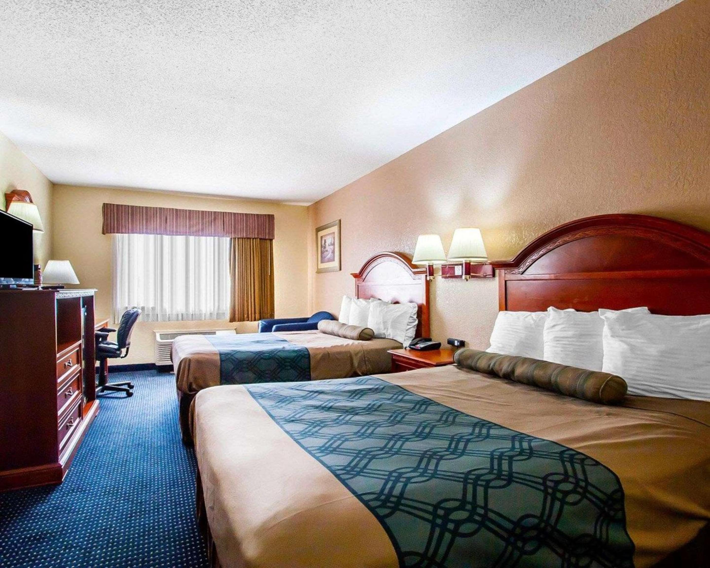Queen Room with Two Queen Beds - Smoking - Photo 1