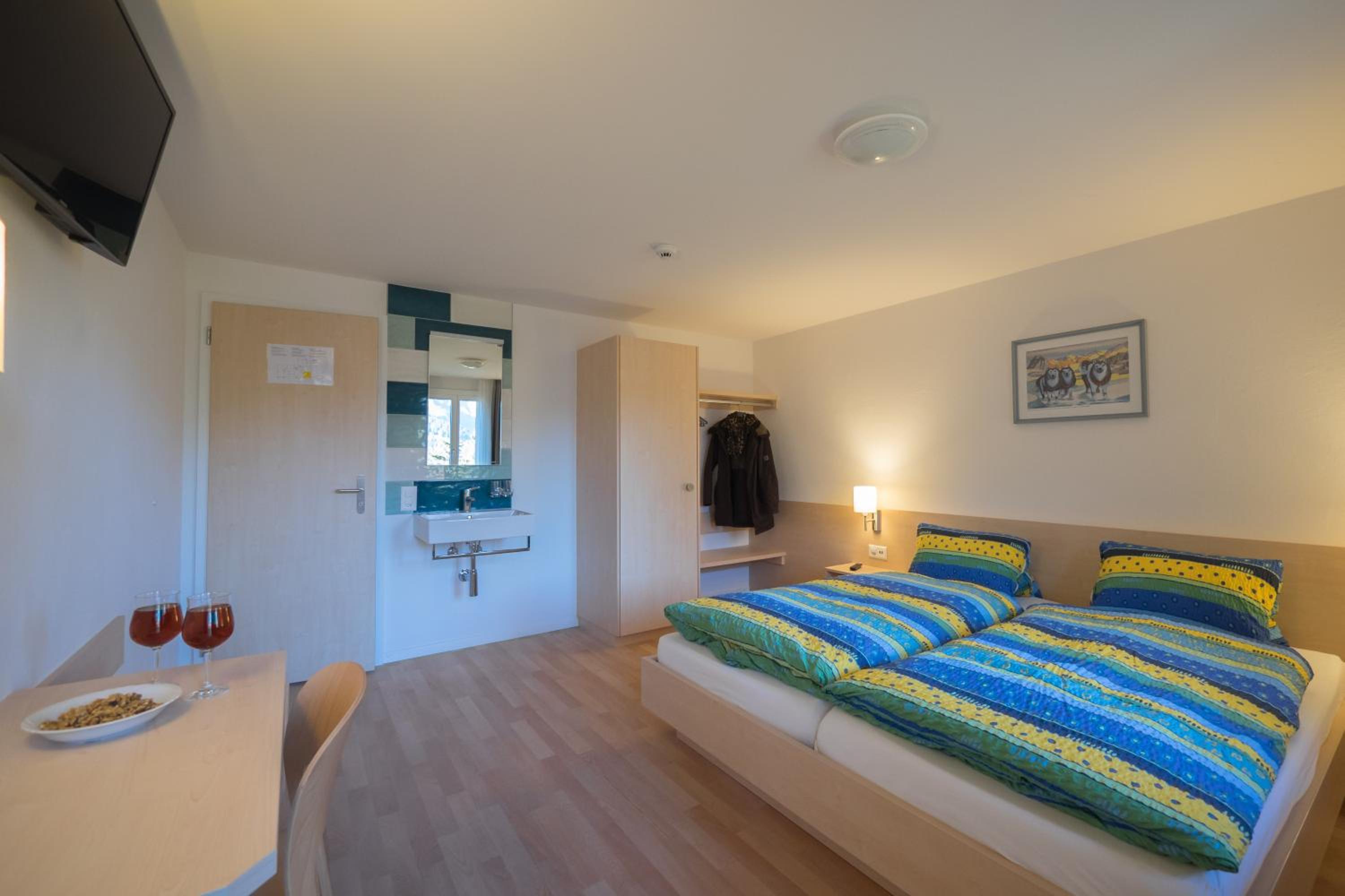 Family Room (2 Adults + 2 Children) with Balcony and Mountain View photo 2