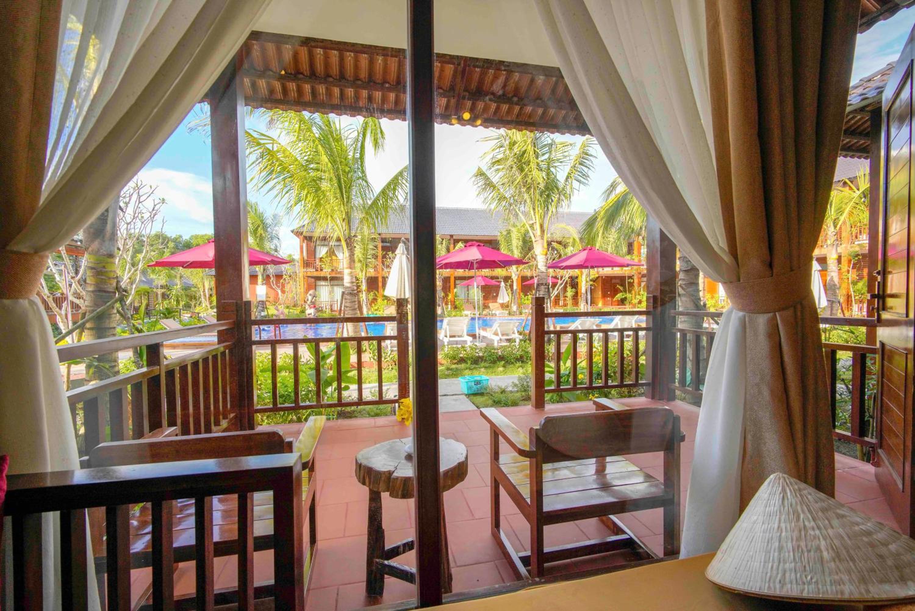 Bungalow with Pool View - Photo 10