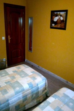 Habitación individual con baño compartido