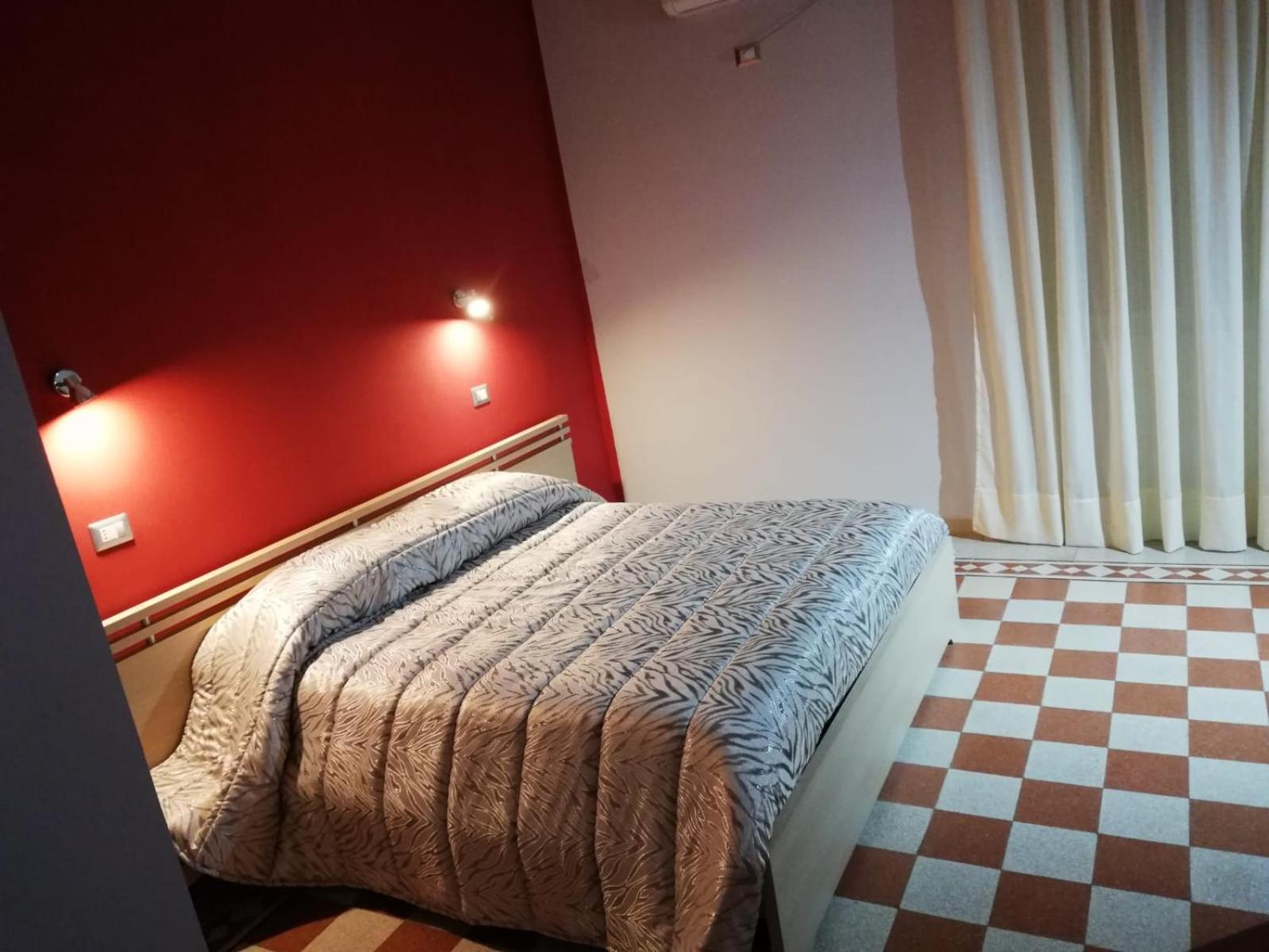 Double Room with Extra Beds and Shared Bathroom