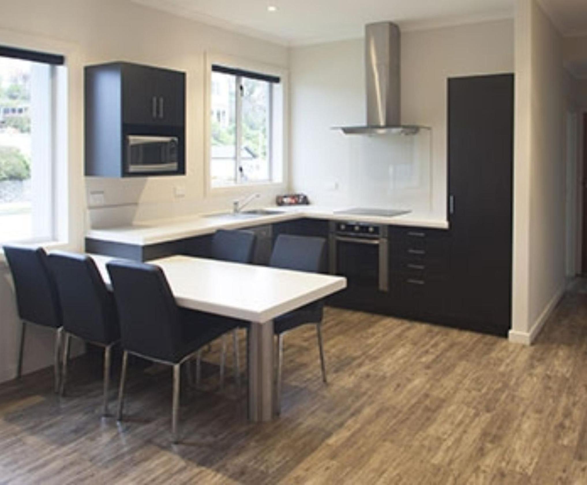 Three-Bedroom Apartment - Photo 2