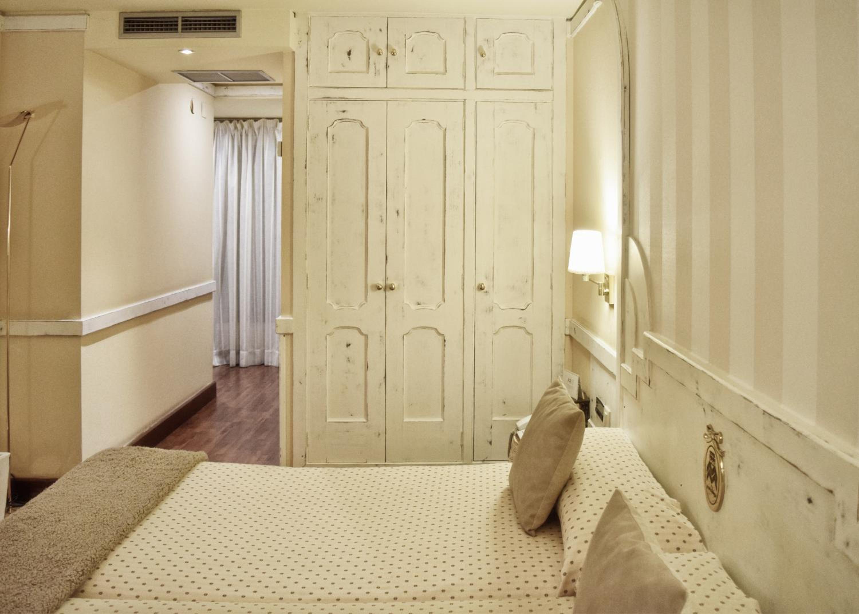 Habitación Cuádruple (2 Adultos + 2 Niños)