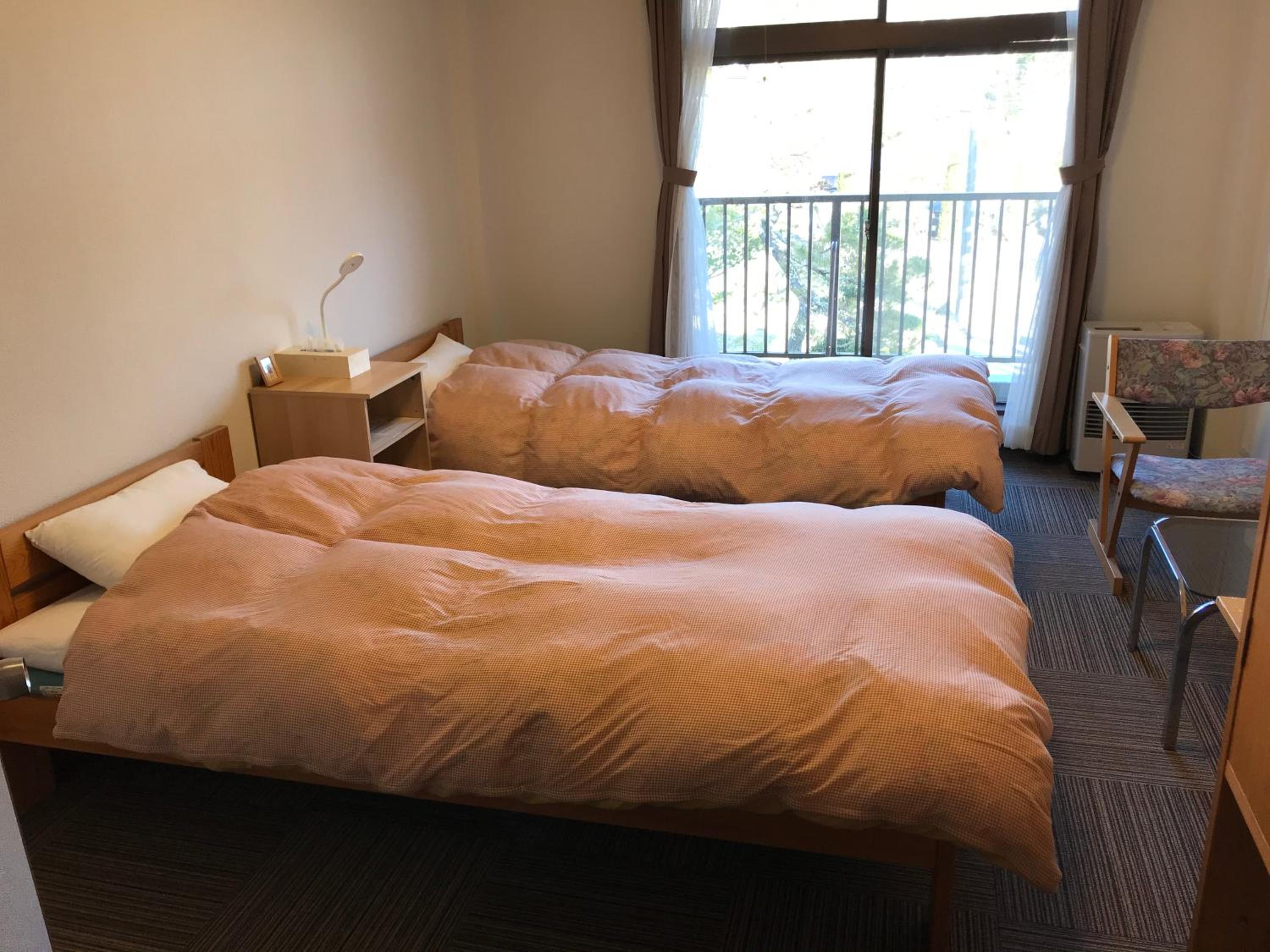 Twin Room with Shared Bathroom