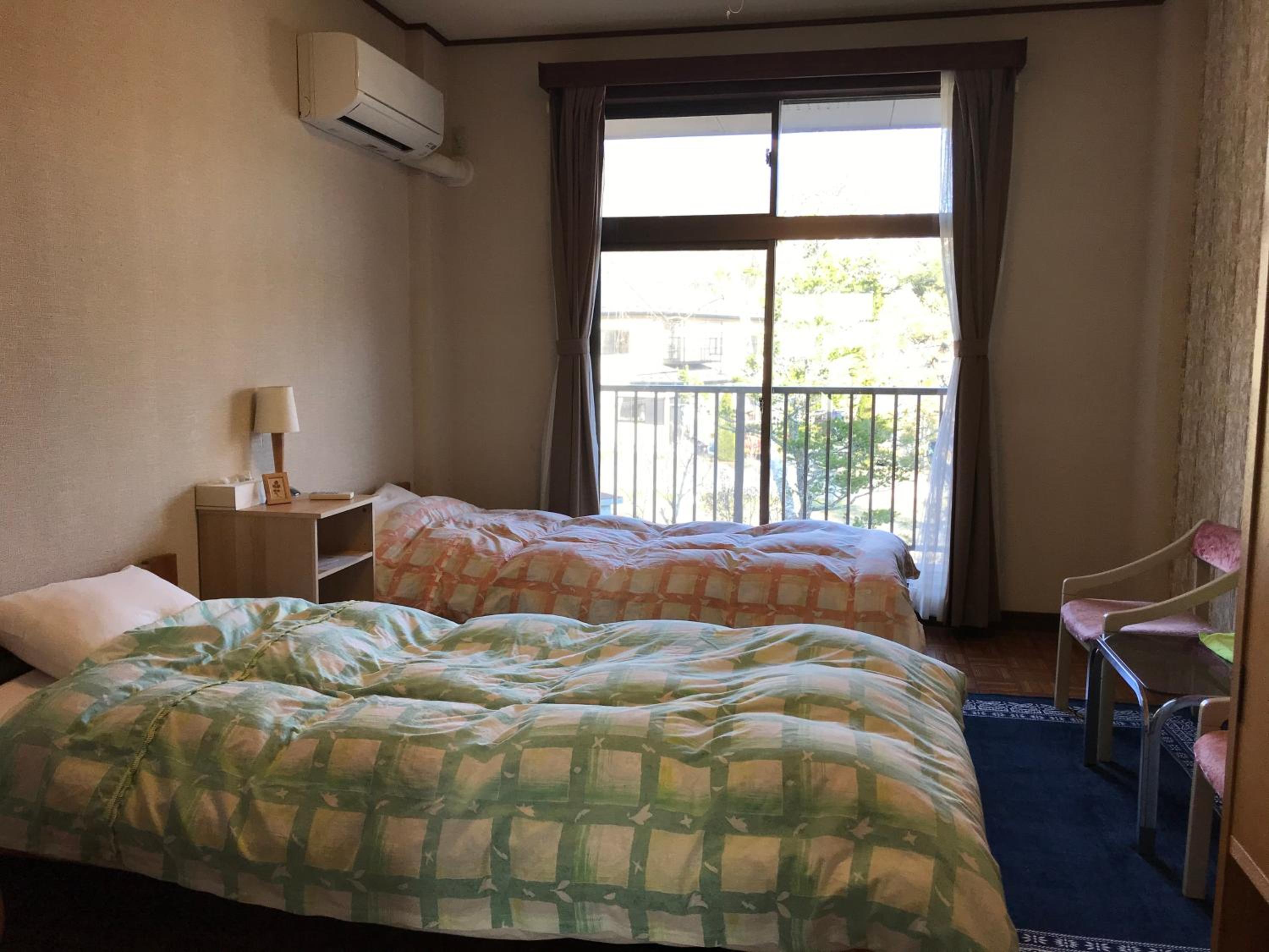 Twin Room with Shared Bathroom