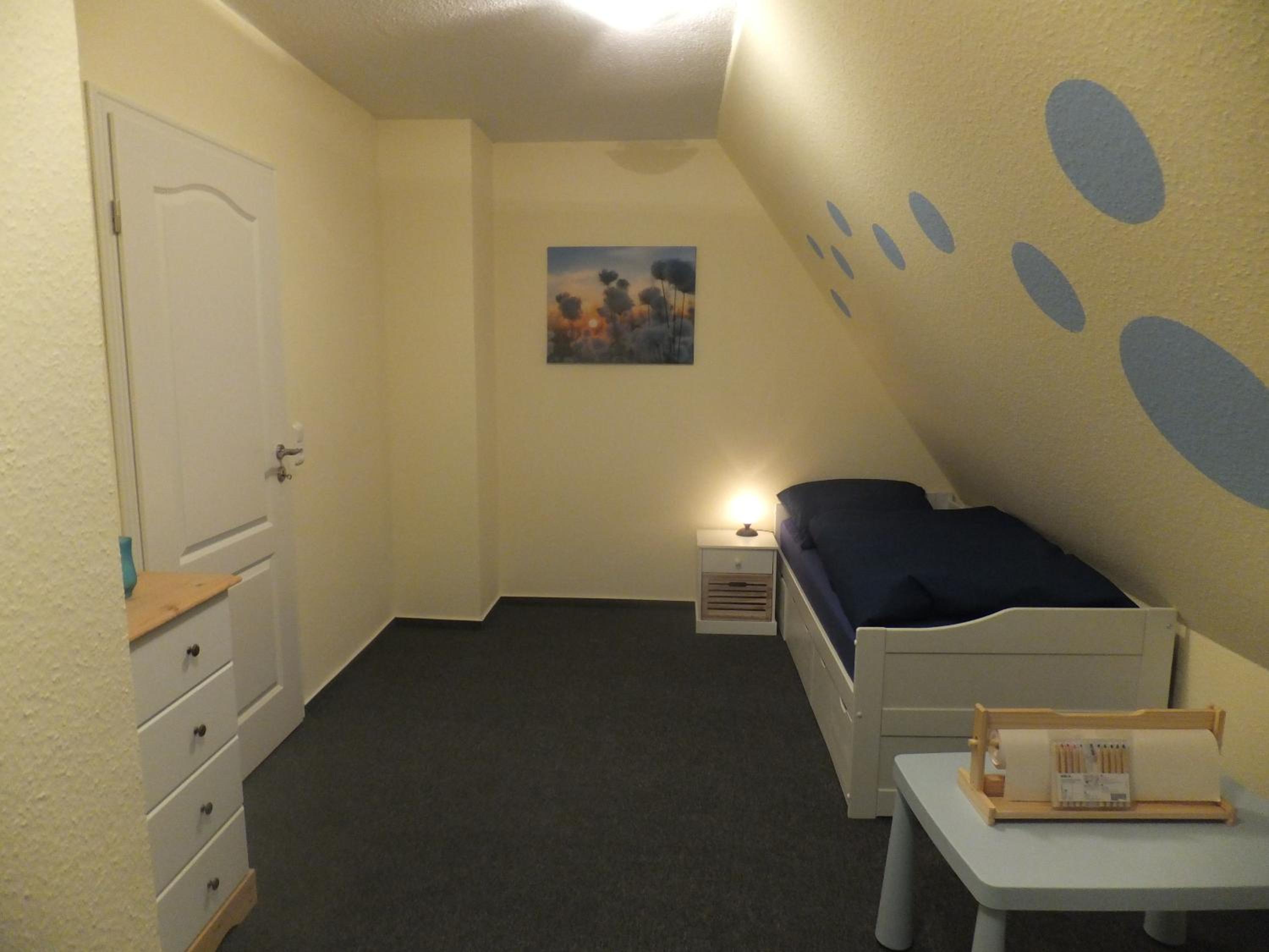 Three-Bedroom Apartment photo 2