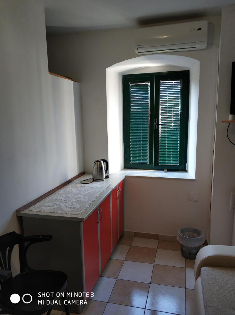 Apartment with Balcony - Photo 2