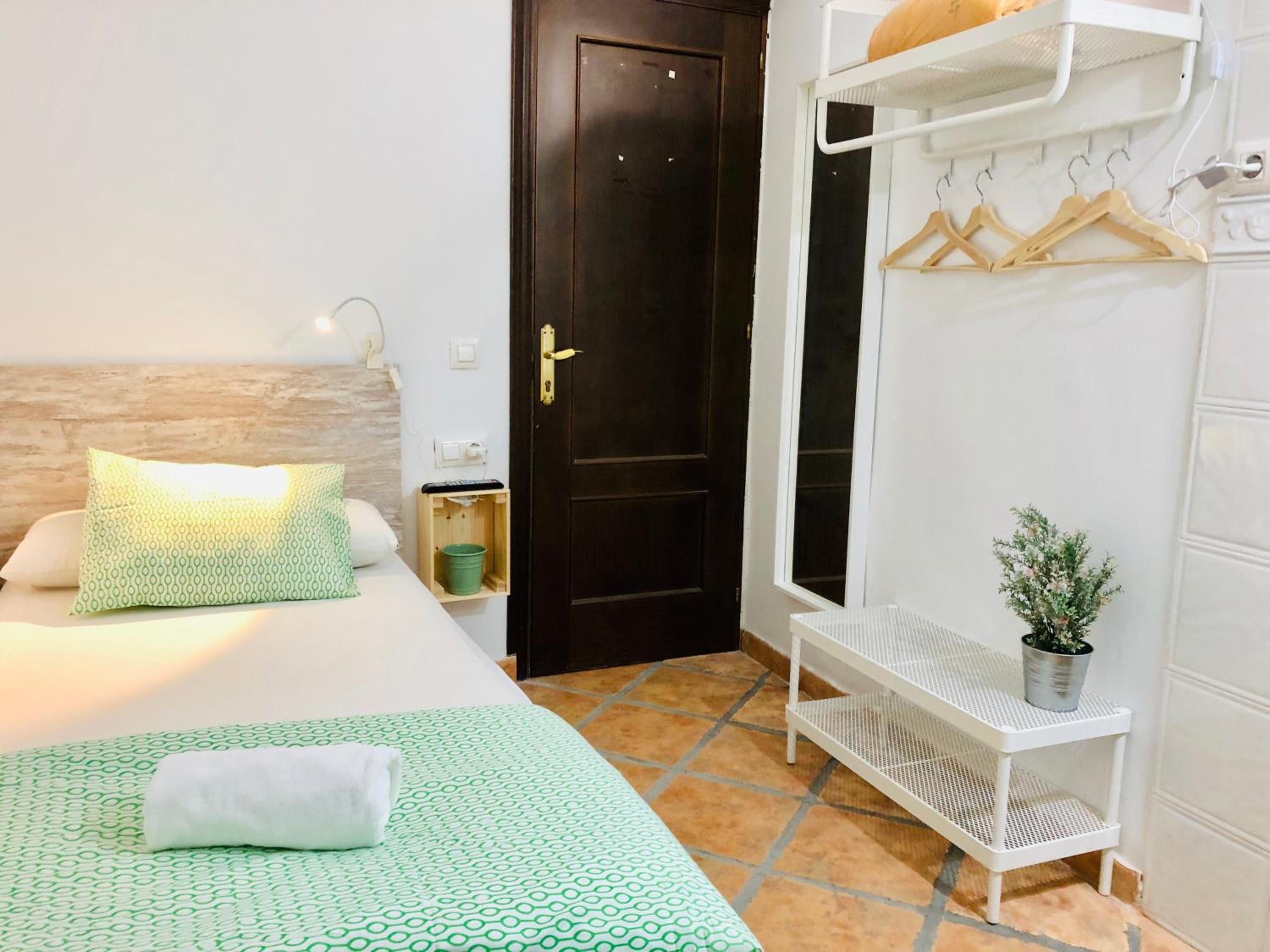 Habitación individual con baño compartido