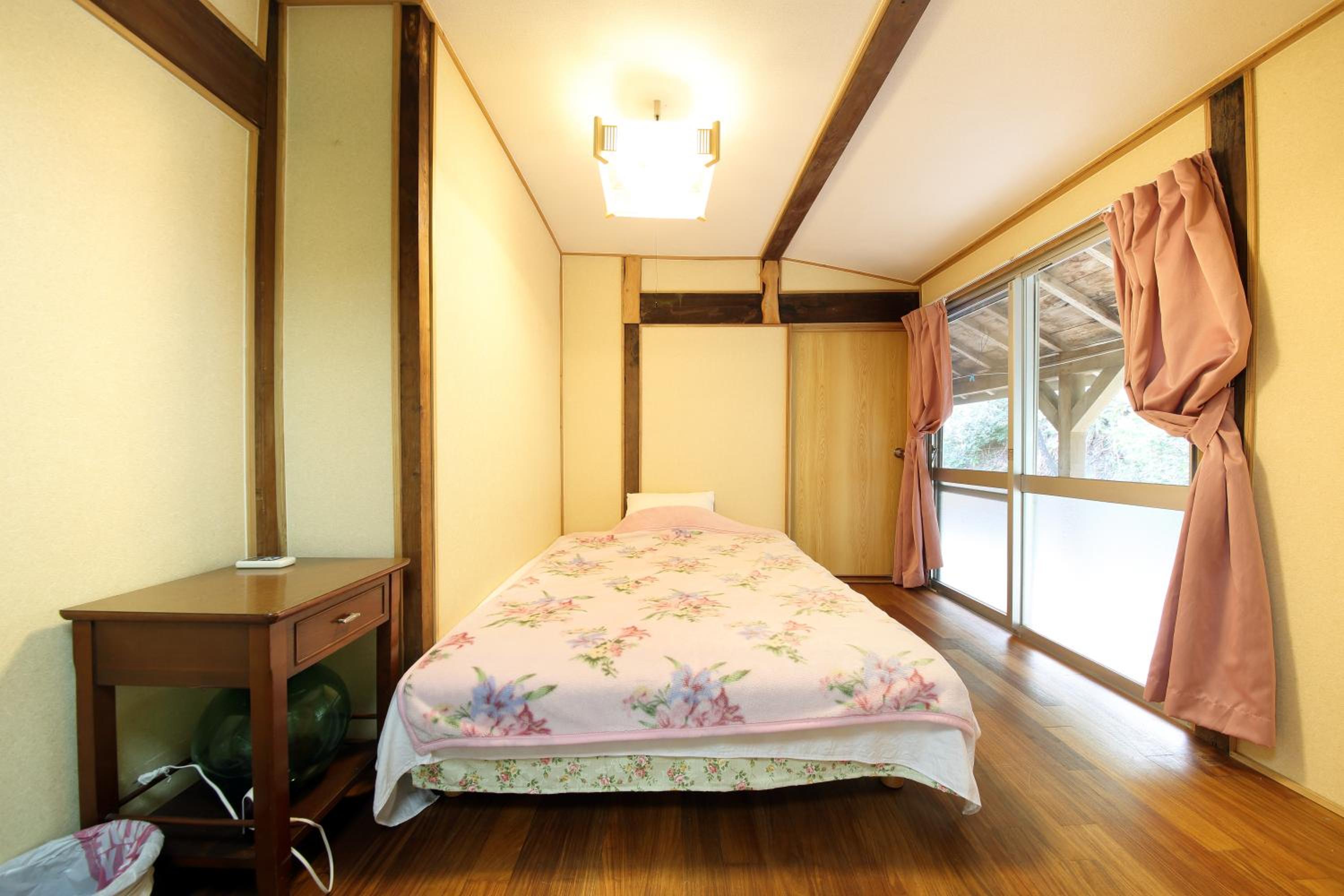 Four-Bedroom House - Photo 51
