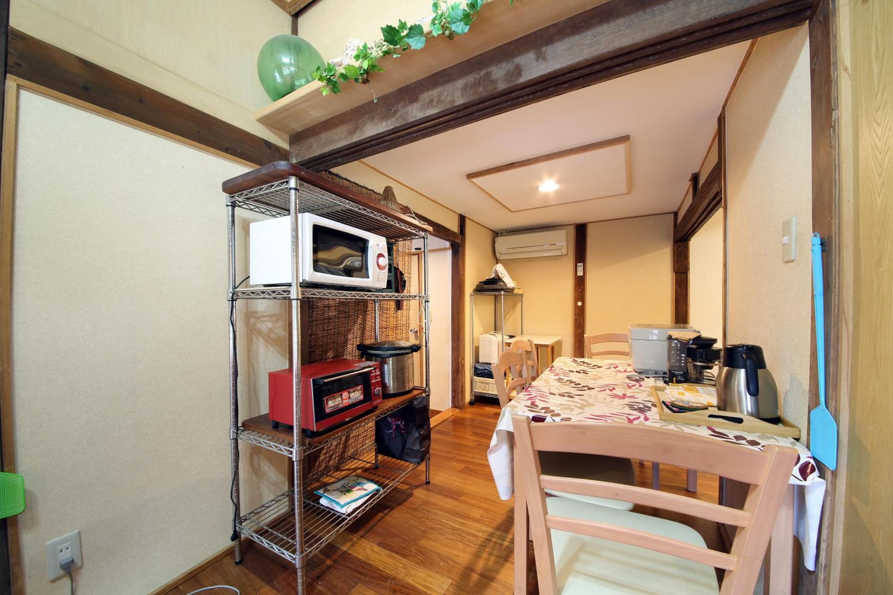 Four-Bedroom House - Photo 44
