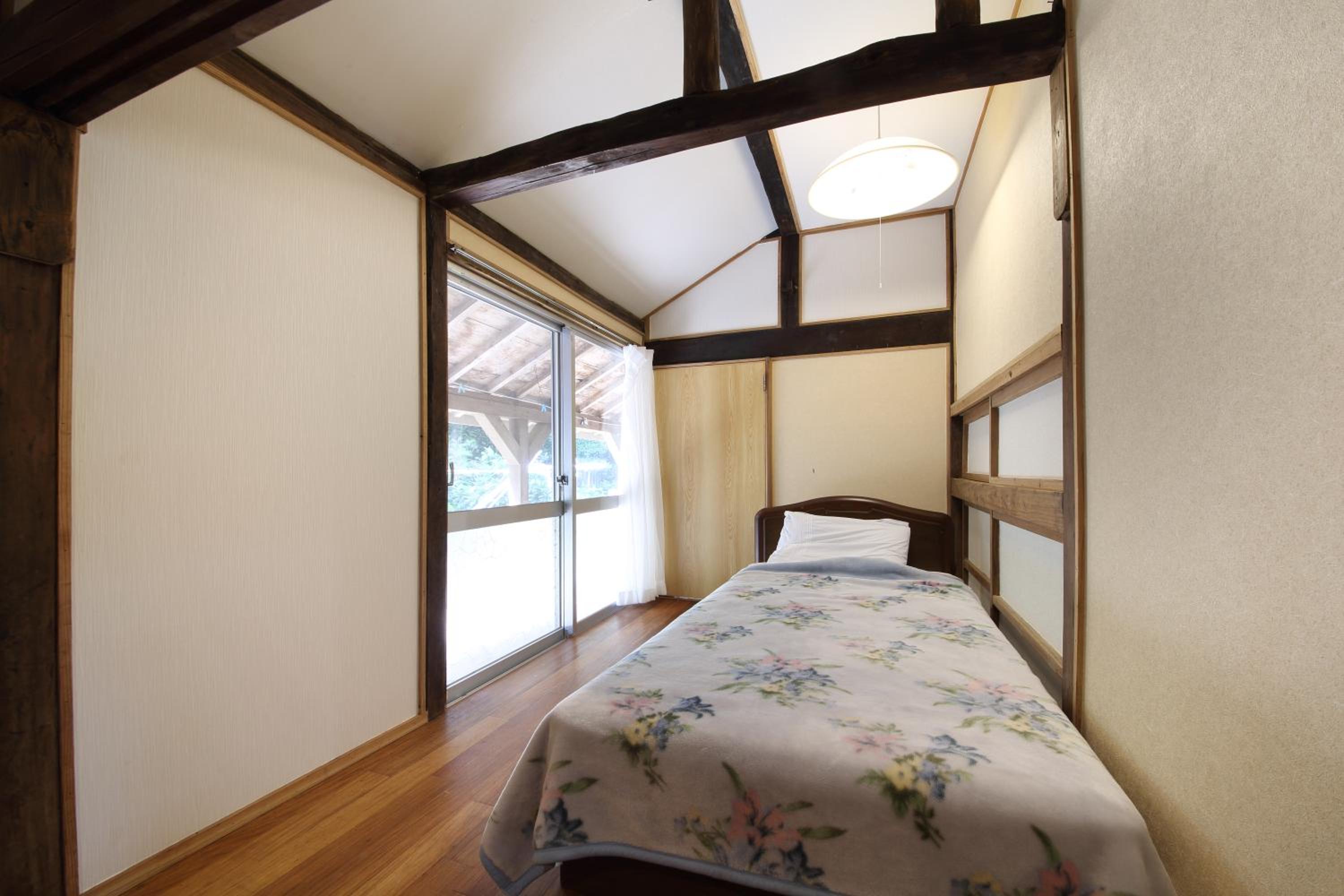Four-Bedroom House - Photo 42