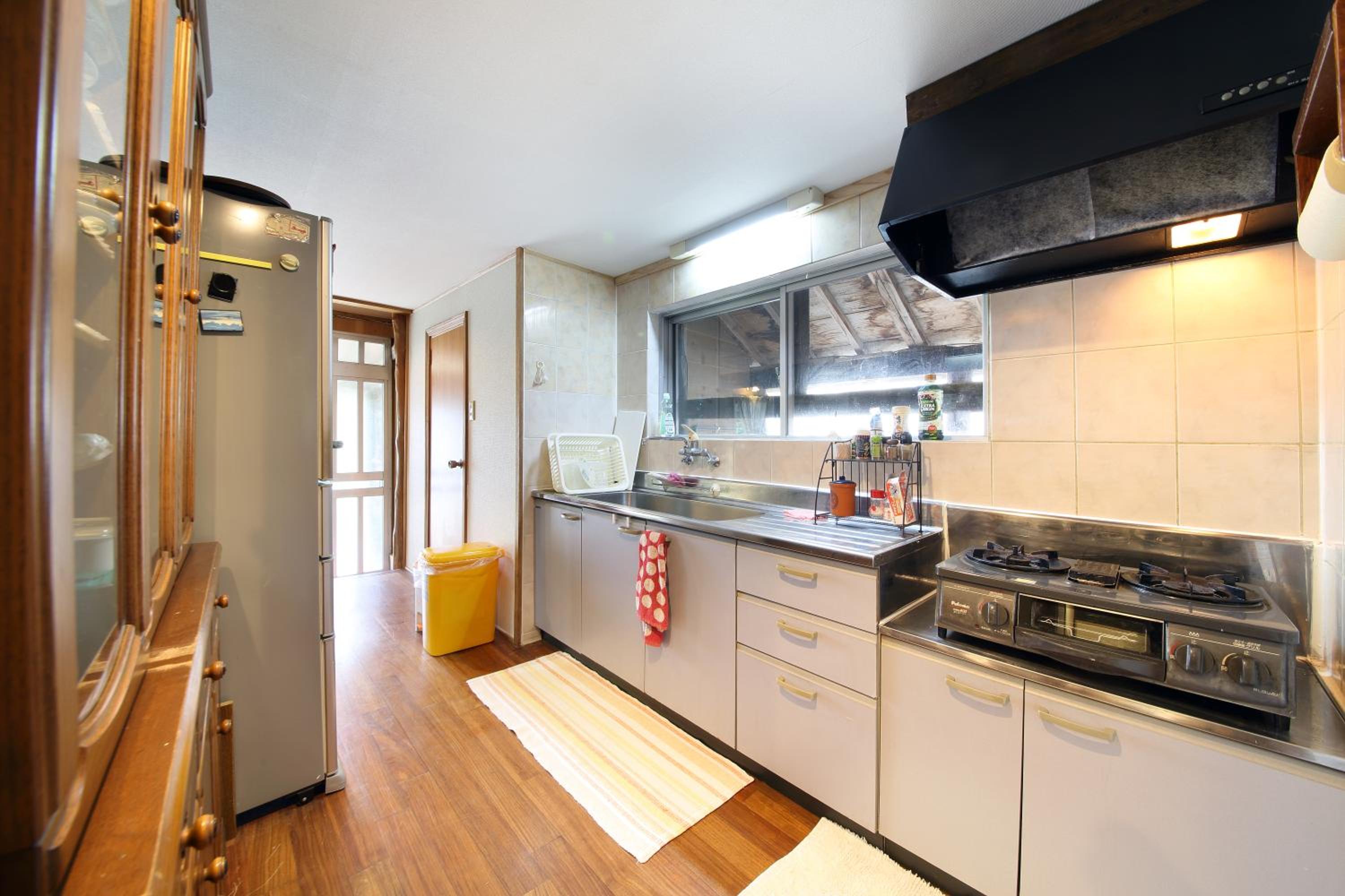 Four-Bedroom House - Photo 39