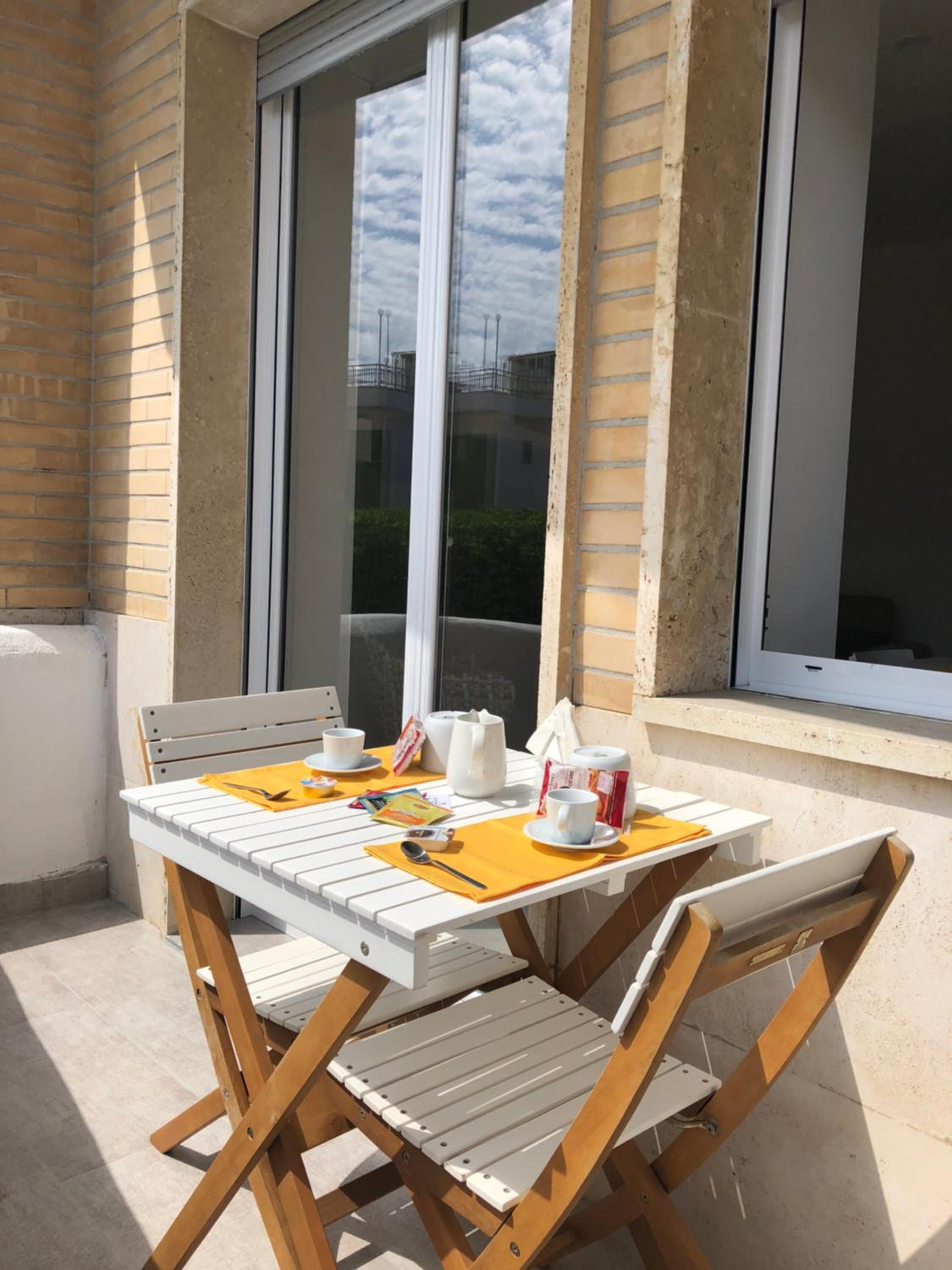 Apartment with Balcony - Photo 18