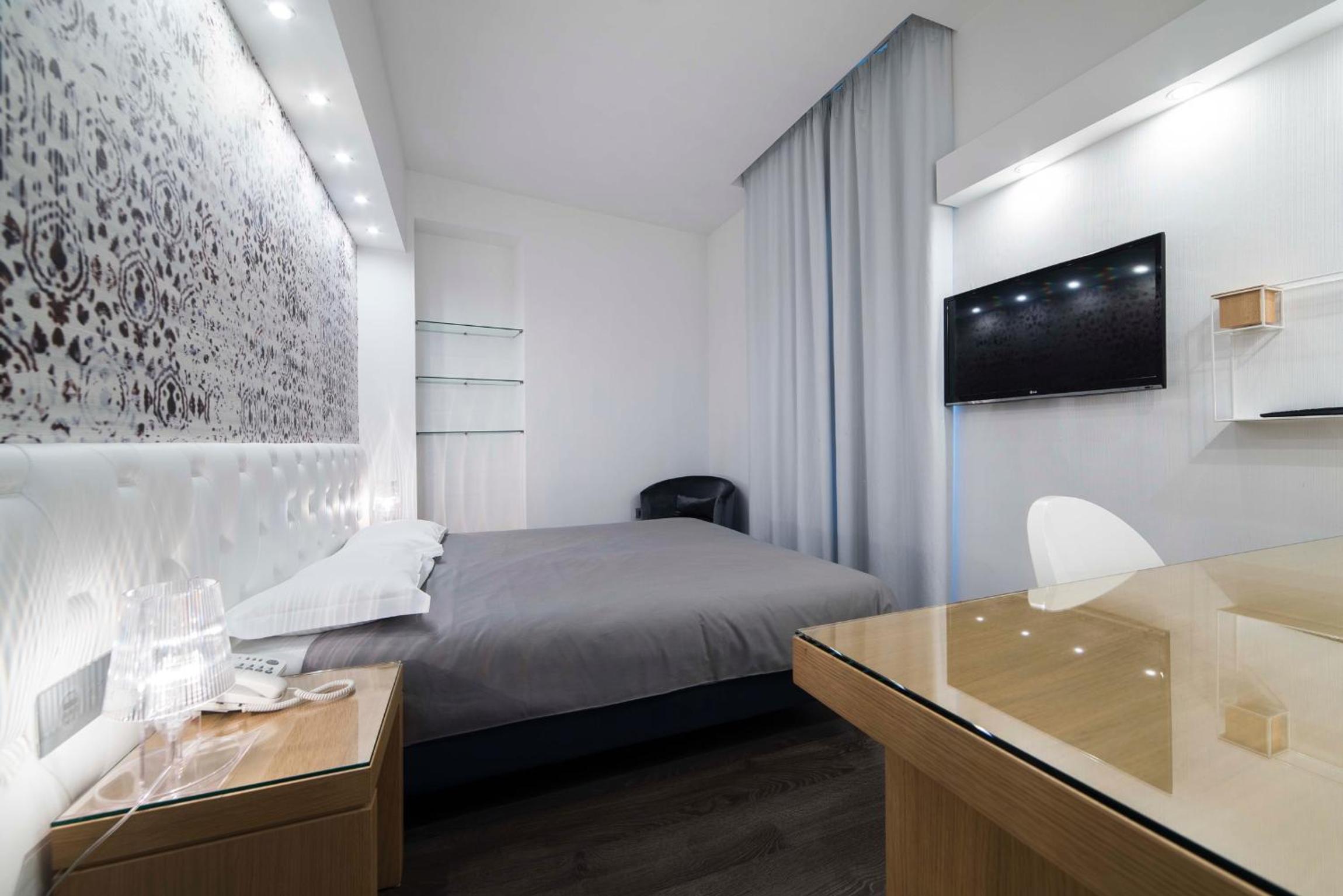 Deluxe Quadruple Room - Photo 8