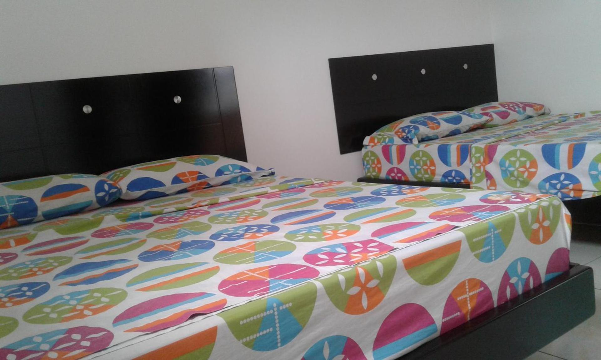 Deluxe Queen Room with Two Queen Beds photo 1