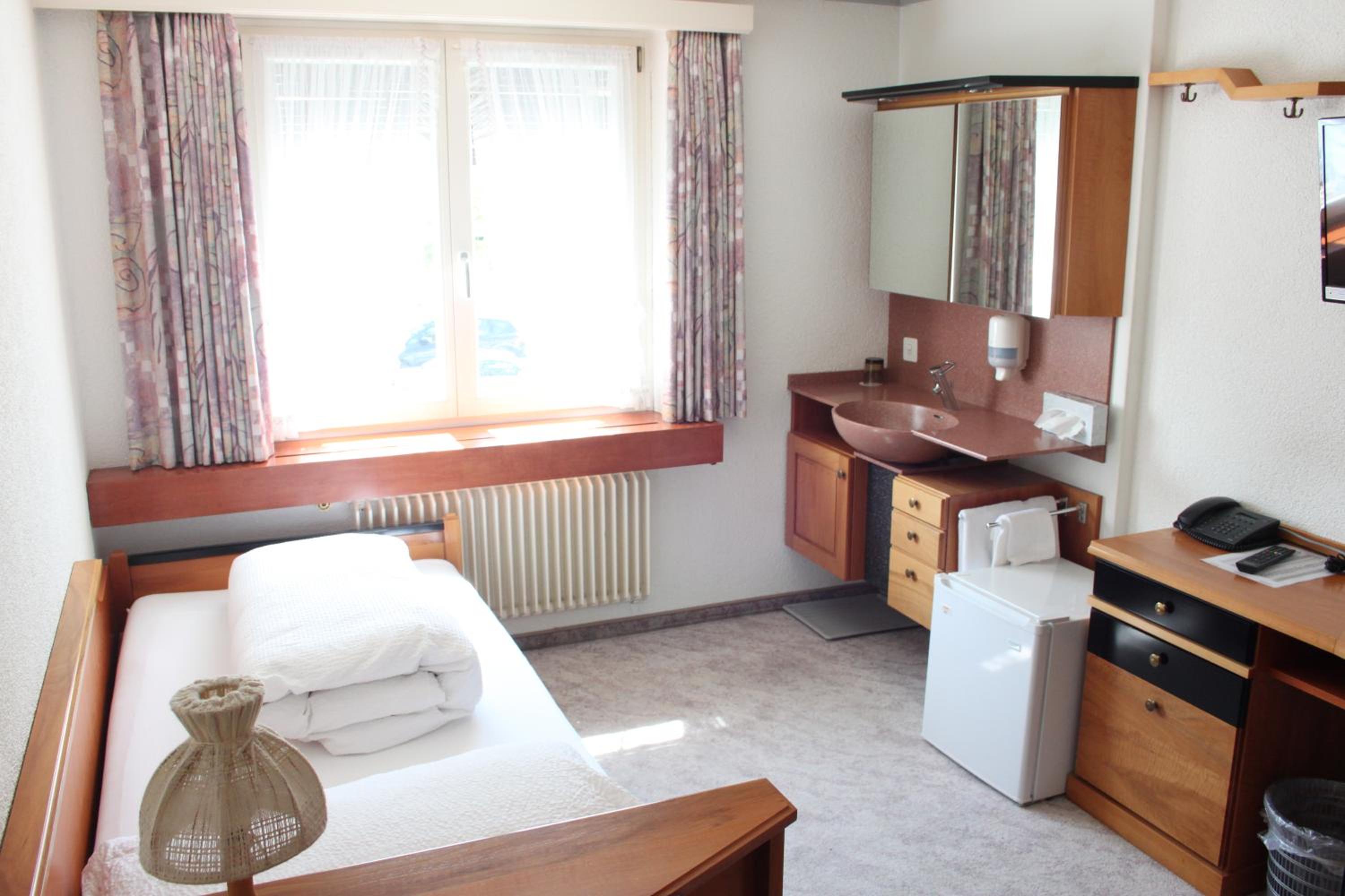 Small Single Room with Shared Bathroom