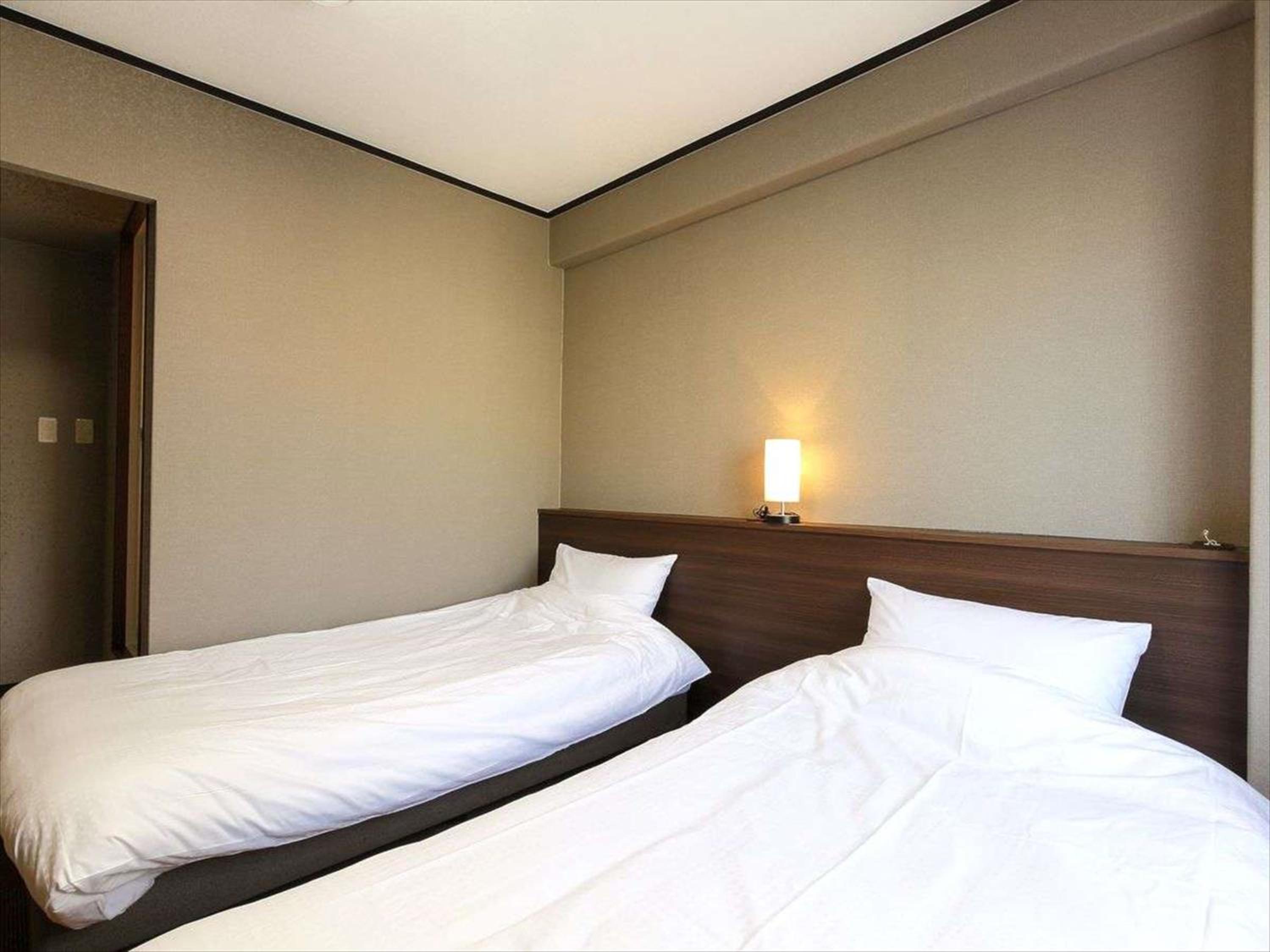 Twin Room - Non-Smoking photo 1