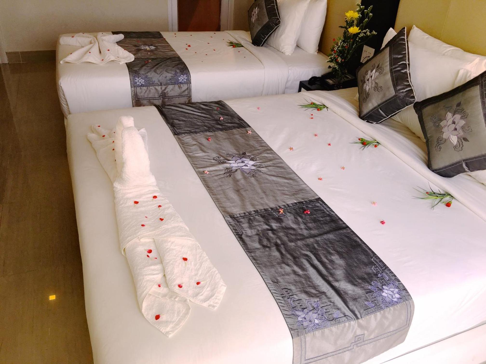 Deluxe Triple Room - Photo 18